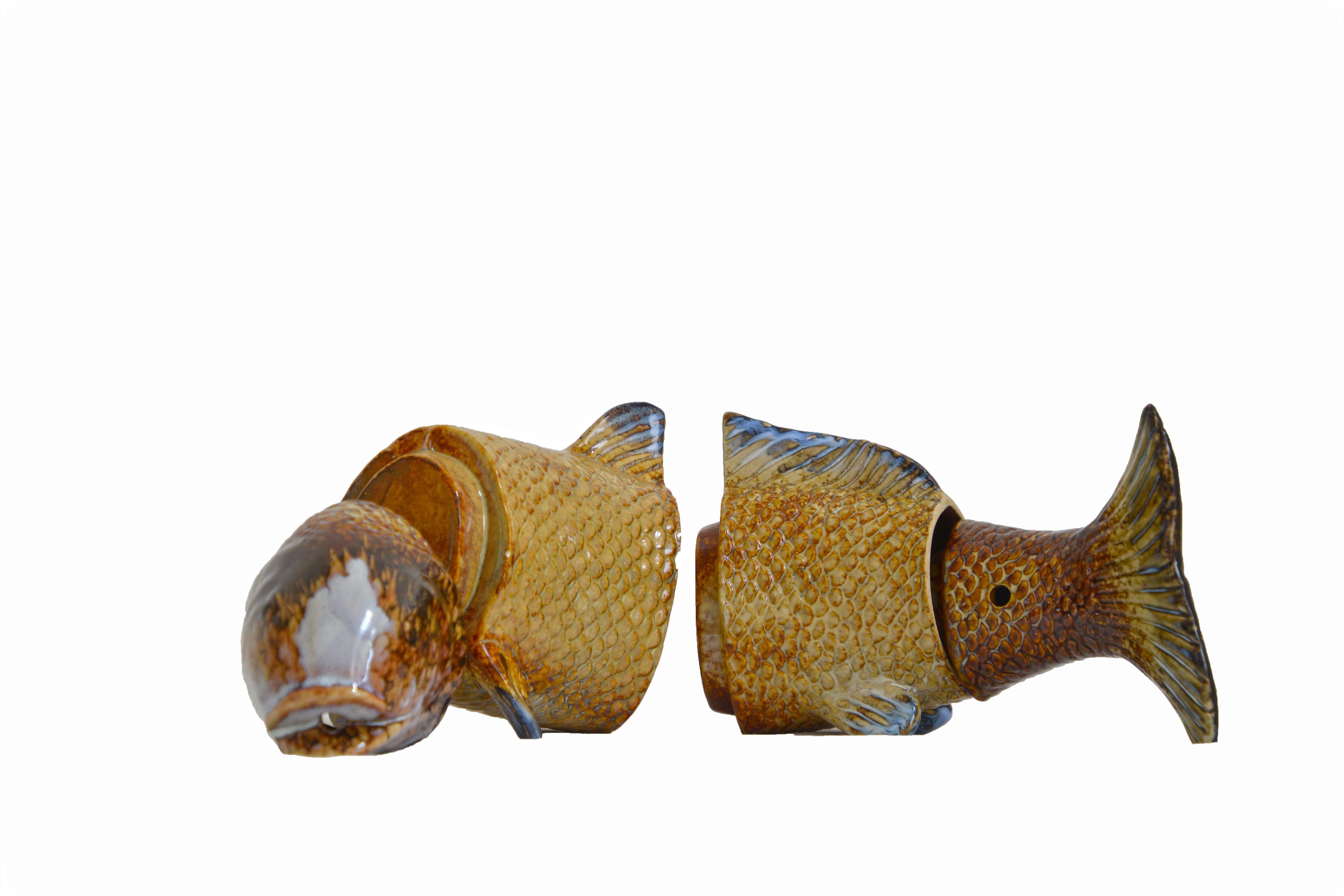 Ceramic 4 pieces carp decoration object. Could be mounted with elastic wires to hold it together and change the look any time. The two center pieces can also be used as small flowerpots, with head and tail as decoration. Funny unusual ceramic