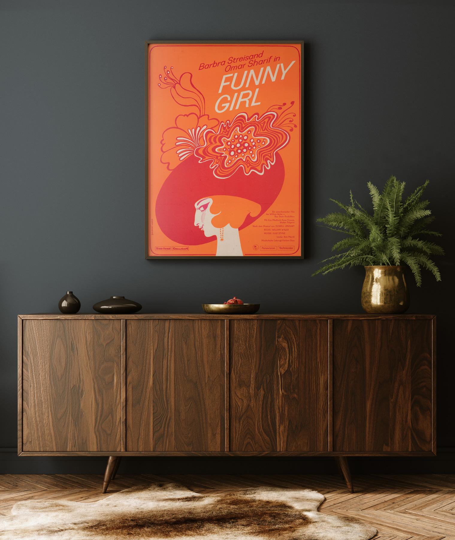 Charming design by Roeder features on this original East German film poster for Funny Girl starring Barbra Streisand and Omar Sharif.

This original vintage movie poster is professionally line backed and sized 22 1/2 x 32 inches inches. It will be