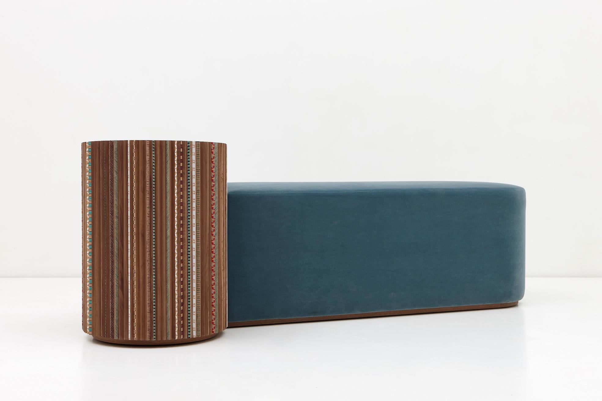 The pleated bench - part of the Funquetry collection which takes a traditional craft to create new patterns with a ‘fun’ edge - is a dialogue between a circular pleated tabletop and a soft velvet seating element. Available for customization.