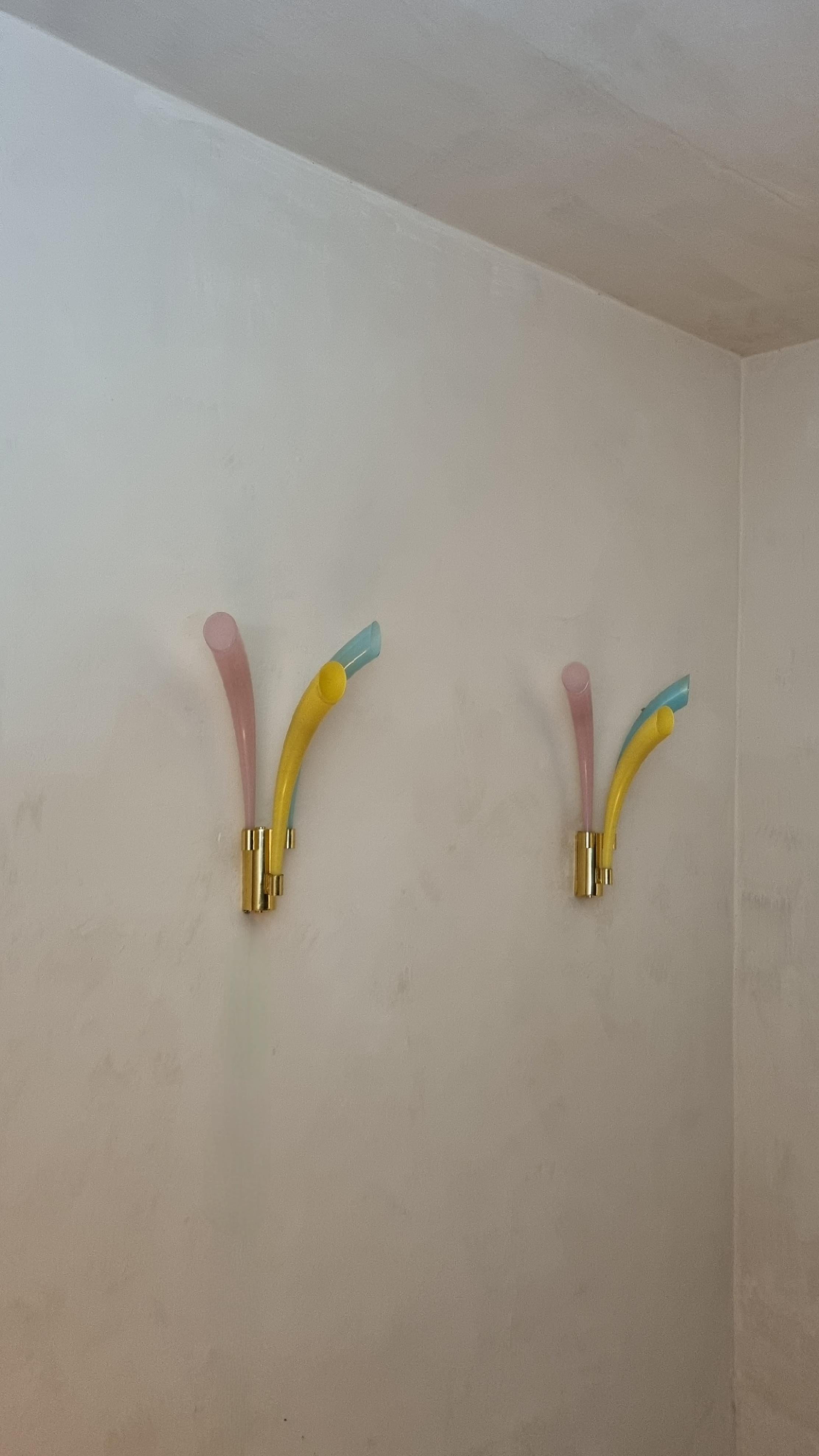 Set of 2 wall sconces designed by Angelo Barovier for Barovier & Toso in the 1986, brass structure, multicolored blown glass with gold leaf inclusions. , mounting G 9 bulbs.
Excellent conditions, new electric plant, perfectly working.

Barovier&toso