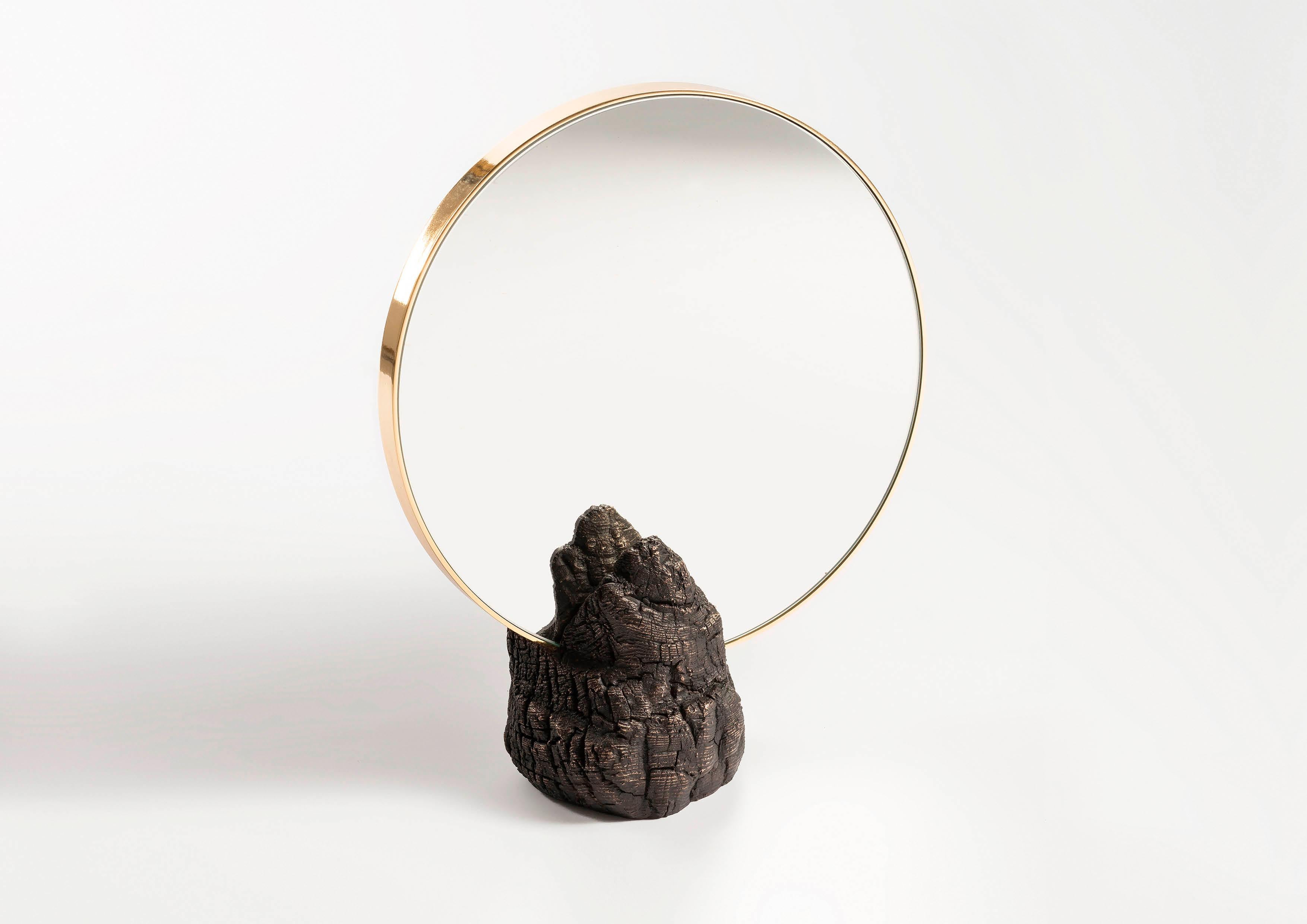 Roberto Sironi has sought out the remains of trees that have been burned by fire, trunks hit by lightning, charred branches salvaged from the mountains. With the ancient technique of bronze casting, Roberto has transformed them in objects of
