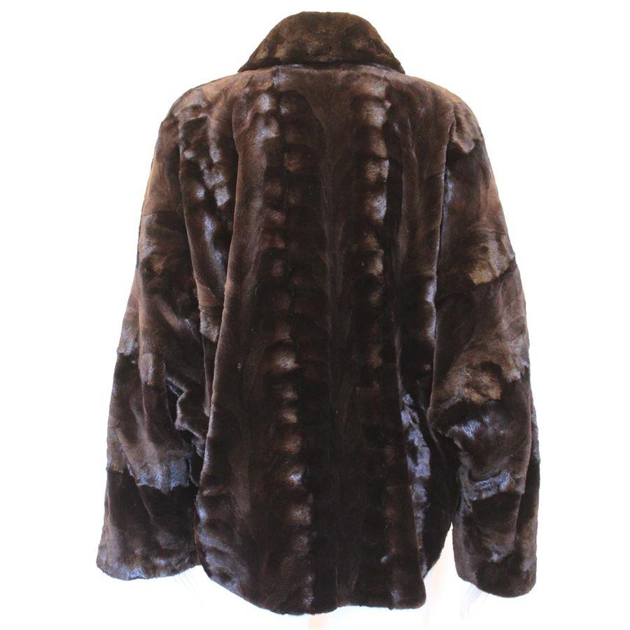 Real mink Black color Brown shaded Two pockets Two jewel buttons Shoulder cm 52 (20.4 inches) Length from shoulder cm 62 (24.4 inches)
