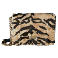 Bolso bandolera de piel con estampado de tigre y cadena metálica dorada Dolce & Gabbana