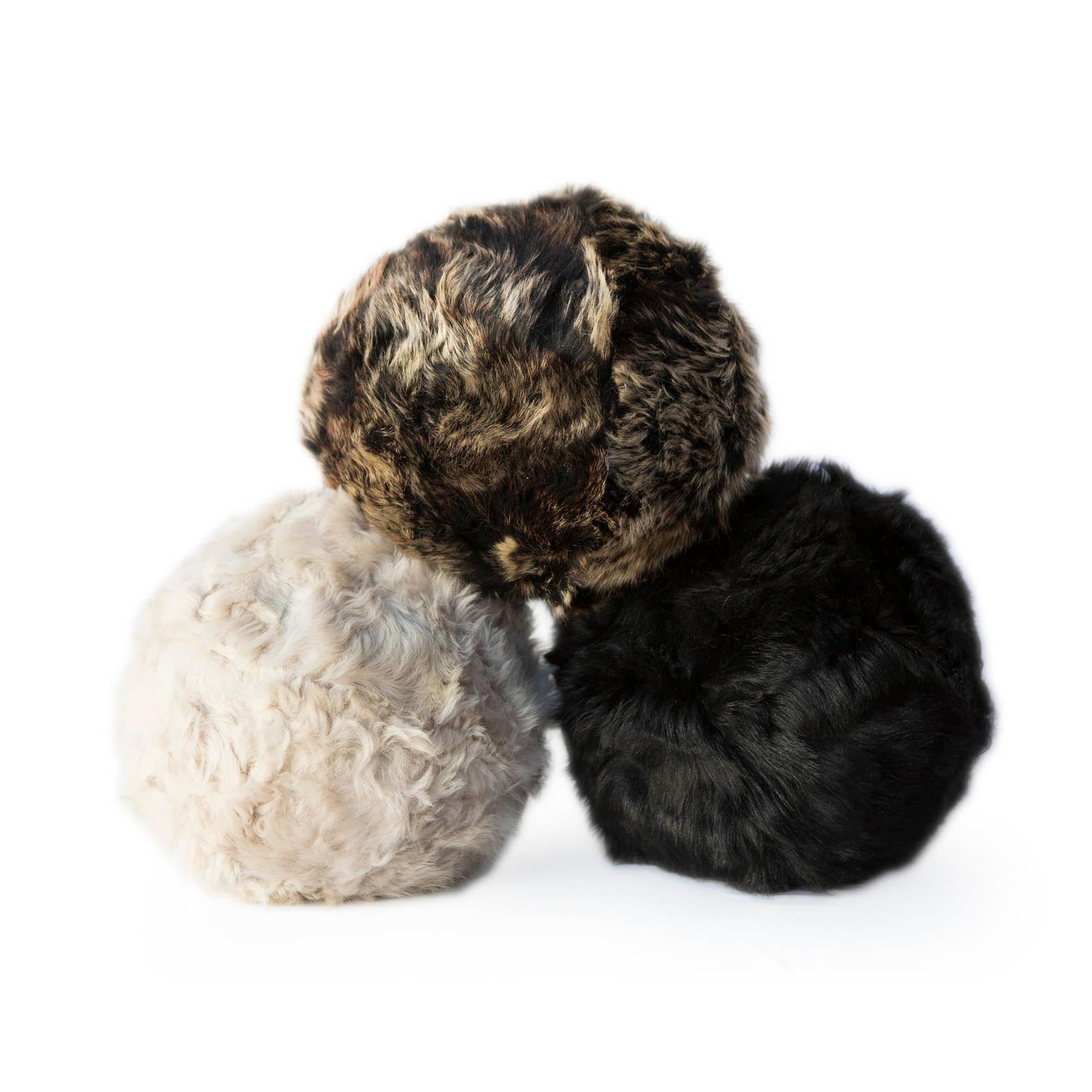 The snowball fur pillow is made from glove factory remnants we have sewn into a custom fabric to provide sustainable, 