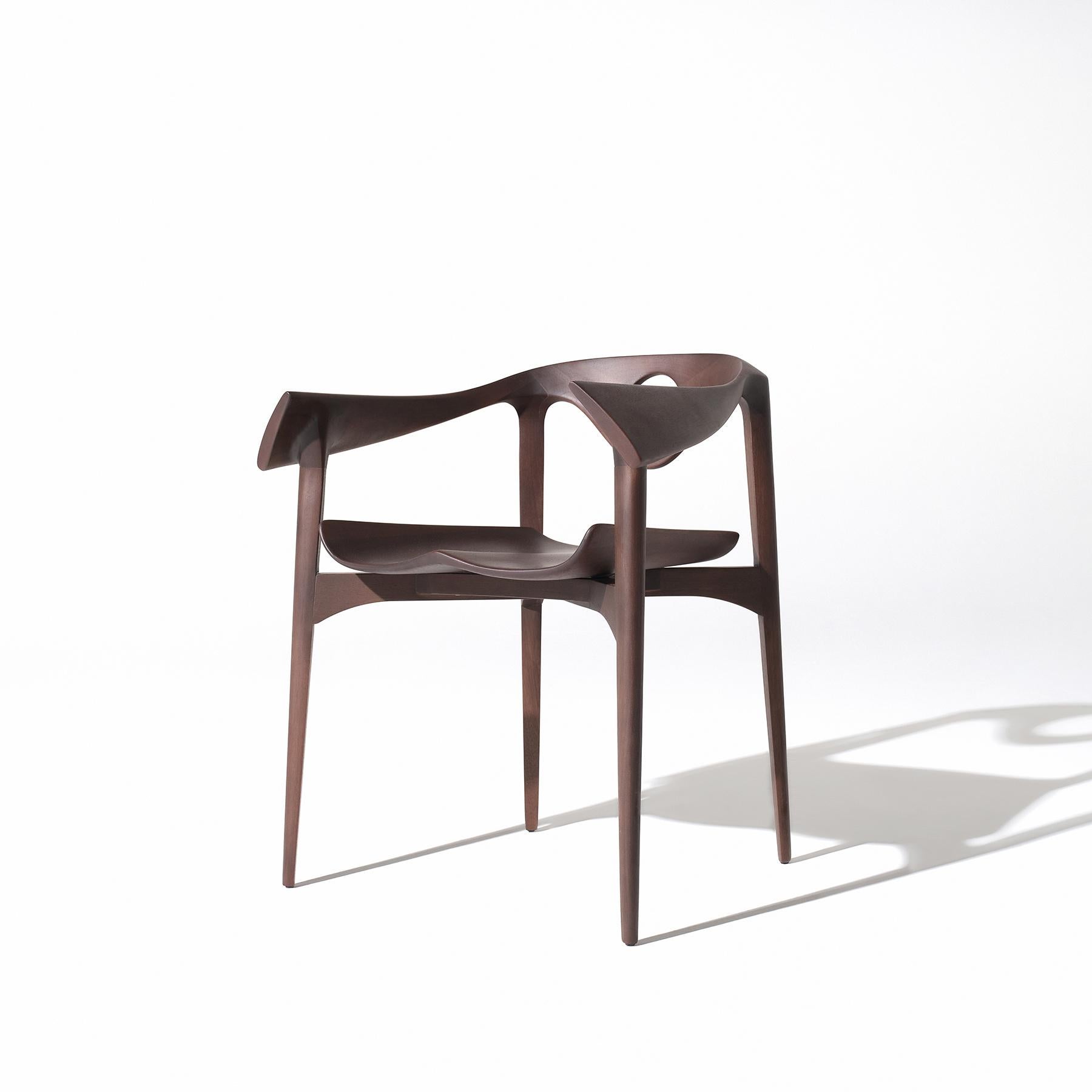 Carved Furcula chair in Jequitiba Brazilian wood in contemporary styly by Tiago Curioni For Sale