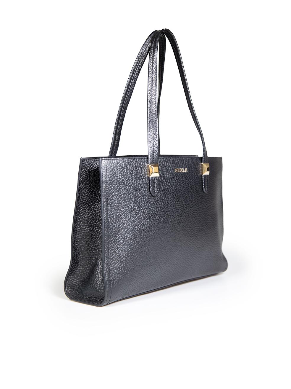 CONDITION is Very good. Minimal wear to bag is evident. Minimal scratches to front bottom right piping. Minimal tarnishing to interior zipper pull on this used Furla designer resale item.
 
 
 
 Details
 
 
 Black
 
 Leather
 
 Medium tote bag
 
