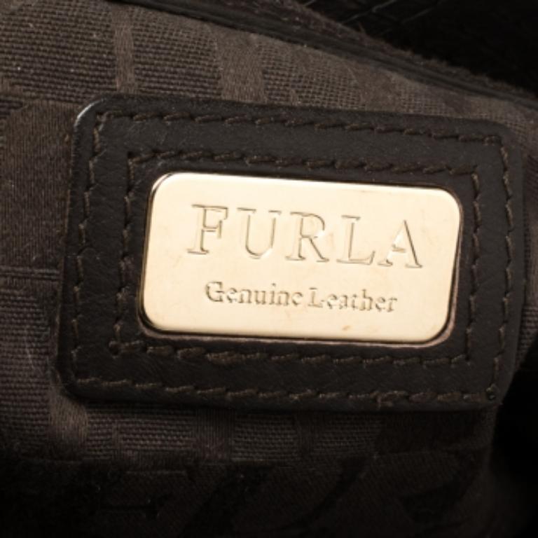 Furla, one of the leading fashion houses, designed this cheerful and subtle hobo. The exterior is made from python-effect leather. This bag features two handles, gold-tone hardware, and a tassel with logo hemisphere fob. This hobo is enclosed with a