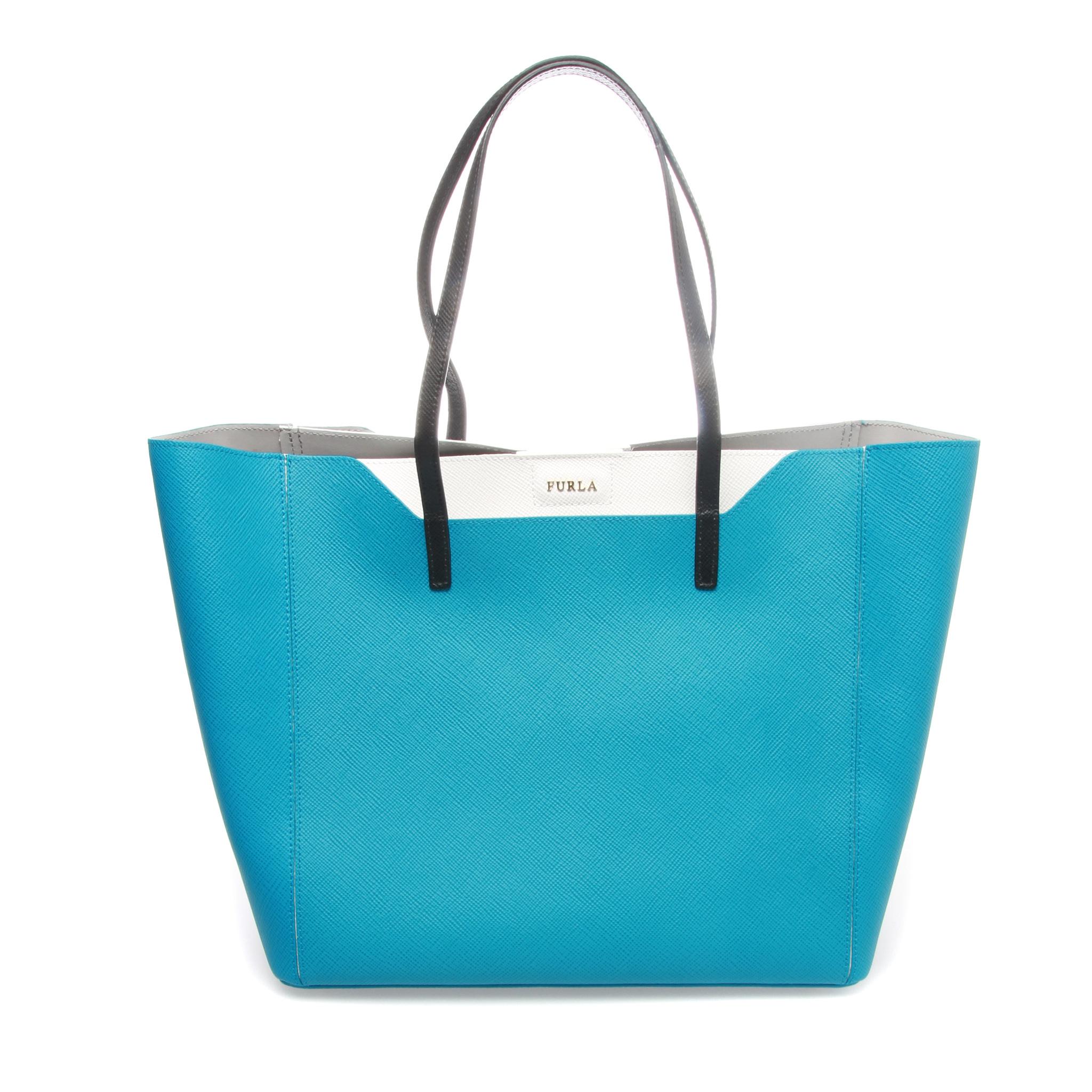 FURLA Fantasia Tote

The Fantasia bag is a new basic tote that features an interesting and practical shape.
Featuring a leather strap easy to carry around, fun to match with your outfit and lovely with its lively and fresh colours. Comes with dust