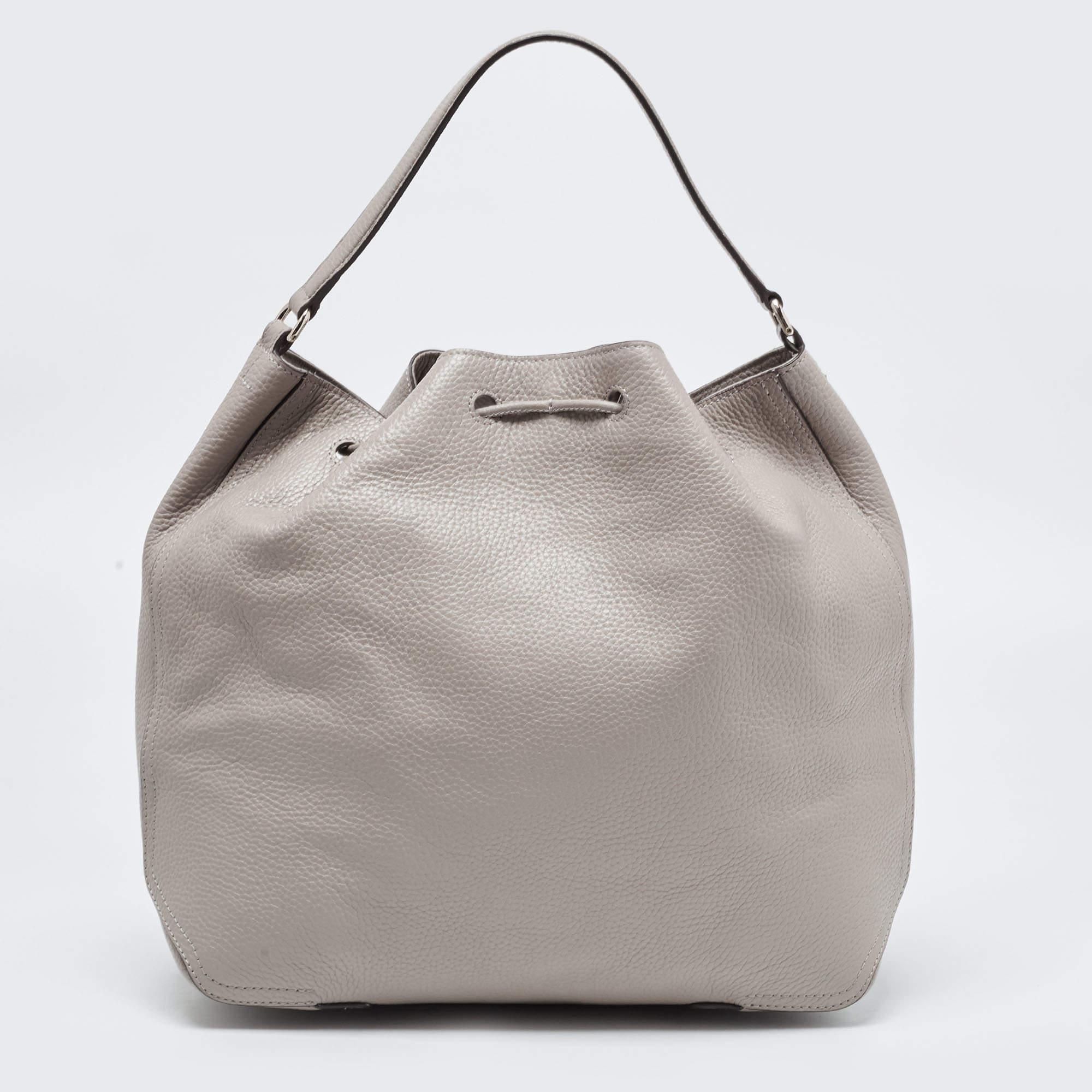 Designer bags are ideal companions for ample occasions! Here we have a fashion-meets-functionality piece crafted with precision. It has been equipped with a well-sized interior that can easily fit your essentials.

Includes: Info Booklet, Original