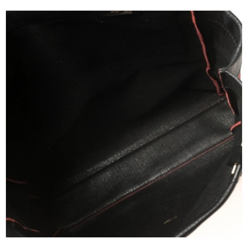 Get set to grab a lot of compliments every time you carry this tote from Furla! The creation is crafted from textured leather and suede and features dual handle straps, the brand label, and a zip pocket to the front. It opens to a spacious interior