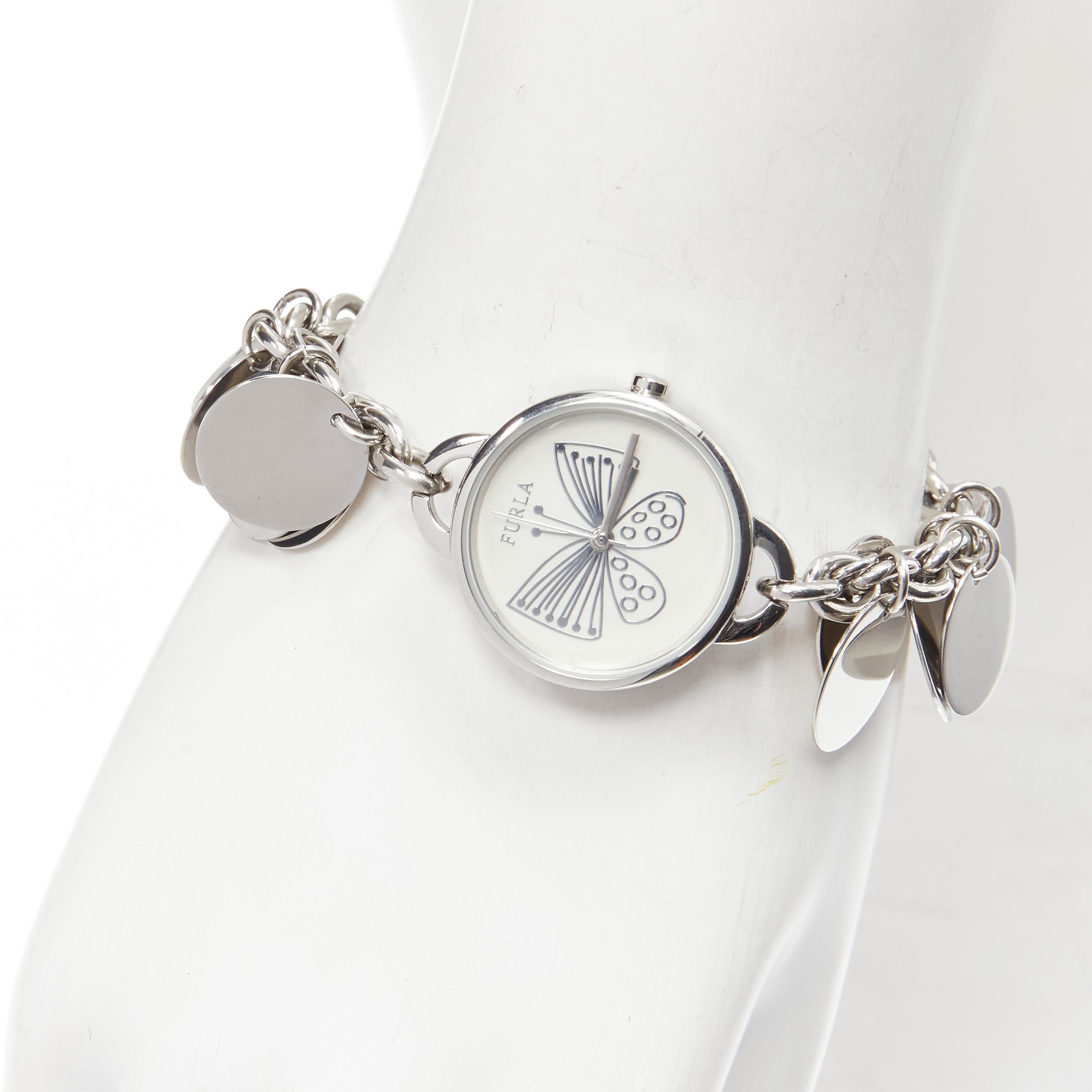 FURLA scribble butterfly logo silver disc chain watch bracelet
Reference: ANWU/A00315
Brand: Furla
Material: Metal
Color: Silver, White
Pattern: Animal Print
Closure: Lobster Clasp
Extra Details: Lobster clasp closure. FURLA logo at the back of