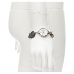FURLA logo papillon griffonné bracelet-montre à disque argenté