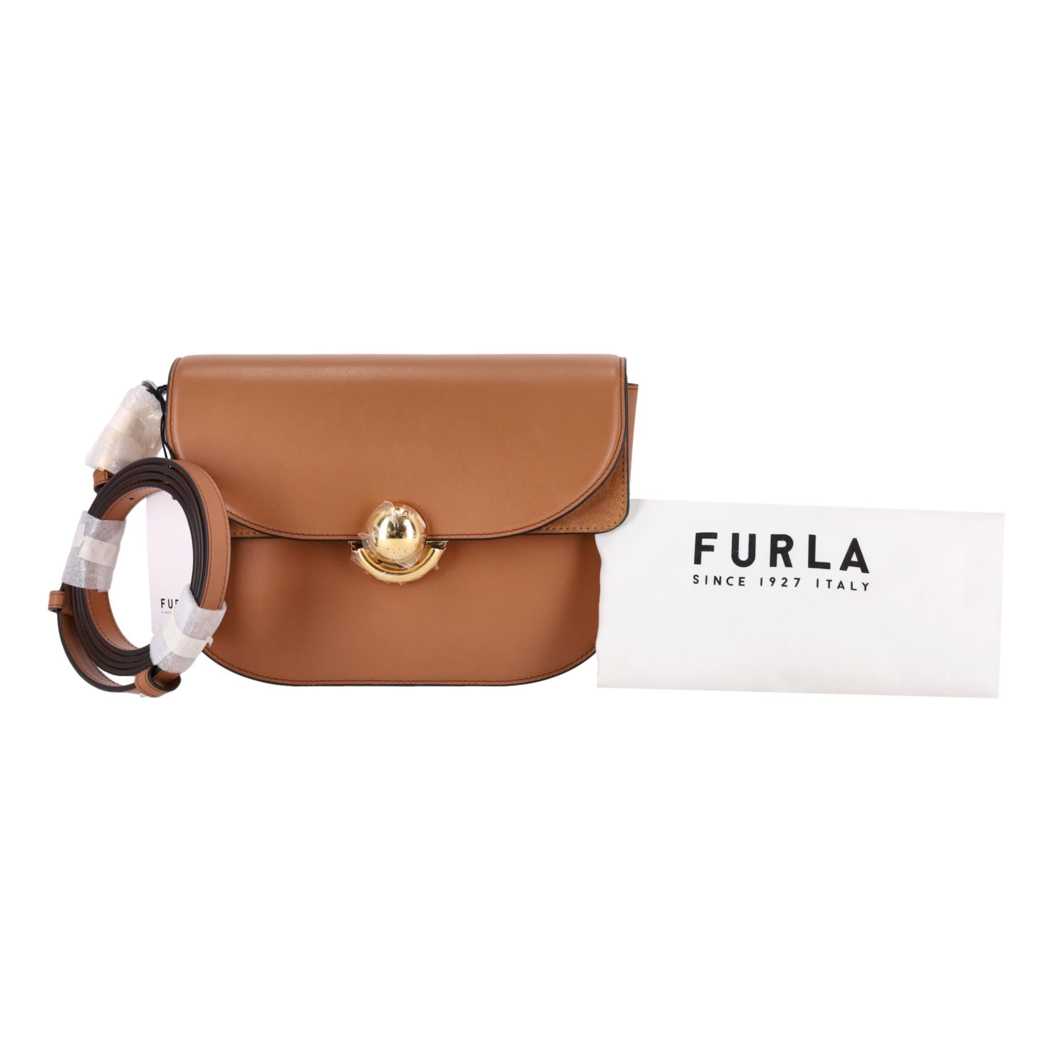 Brand New - Furla Sfera Leather Small Crossbody Bag

Camel brown leather bag crafted from smooth leather with suede details on the inner flap.

Featuring signature gold new round Sfera closure and adjustable leather shoulder/crossbody strap.

Front