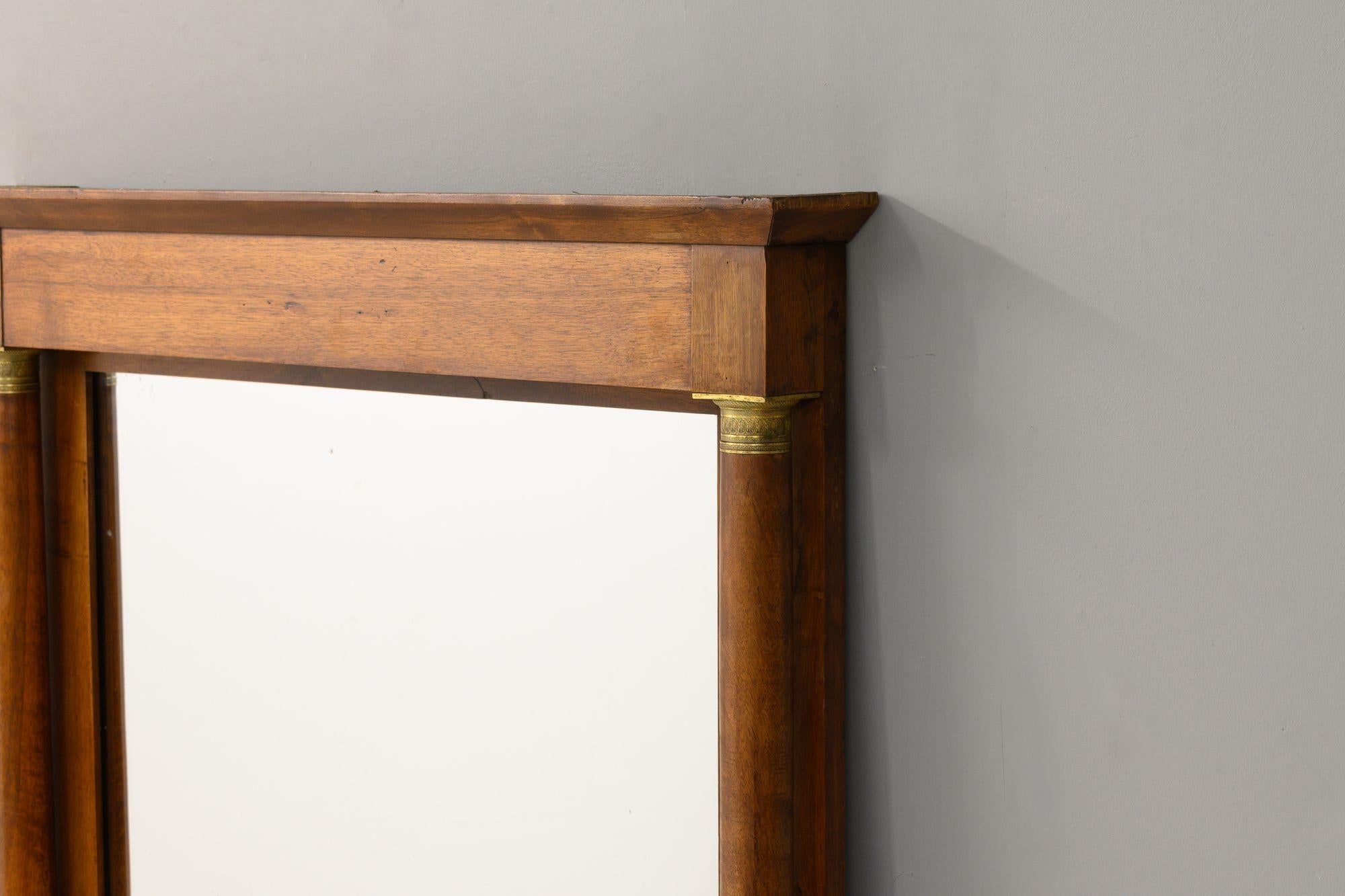 Mahogany framed French Empire style mirror with original plate. Circa 1870
H 170cm x W 103cm x D 13cm