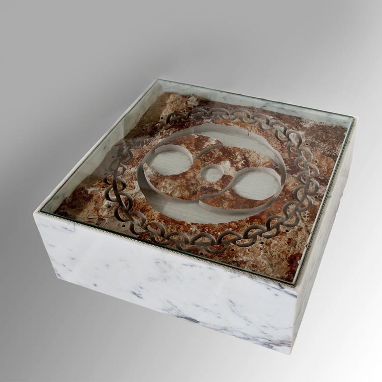 Handcrafted with exceptional care for detail, this gorgeous coffee table will make for a stately accent to contemporary interior decor. A sculptural design of timeless sophistication, it is inspired by crop circles. Elegant and refined, it is