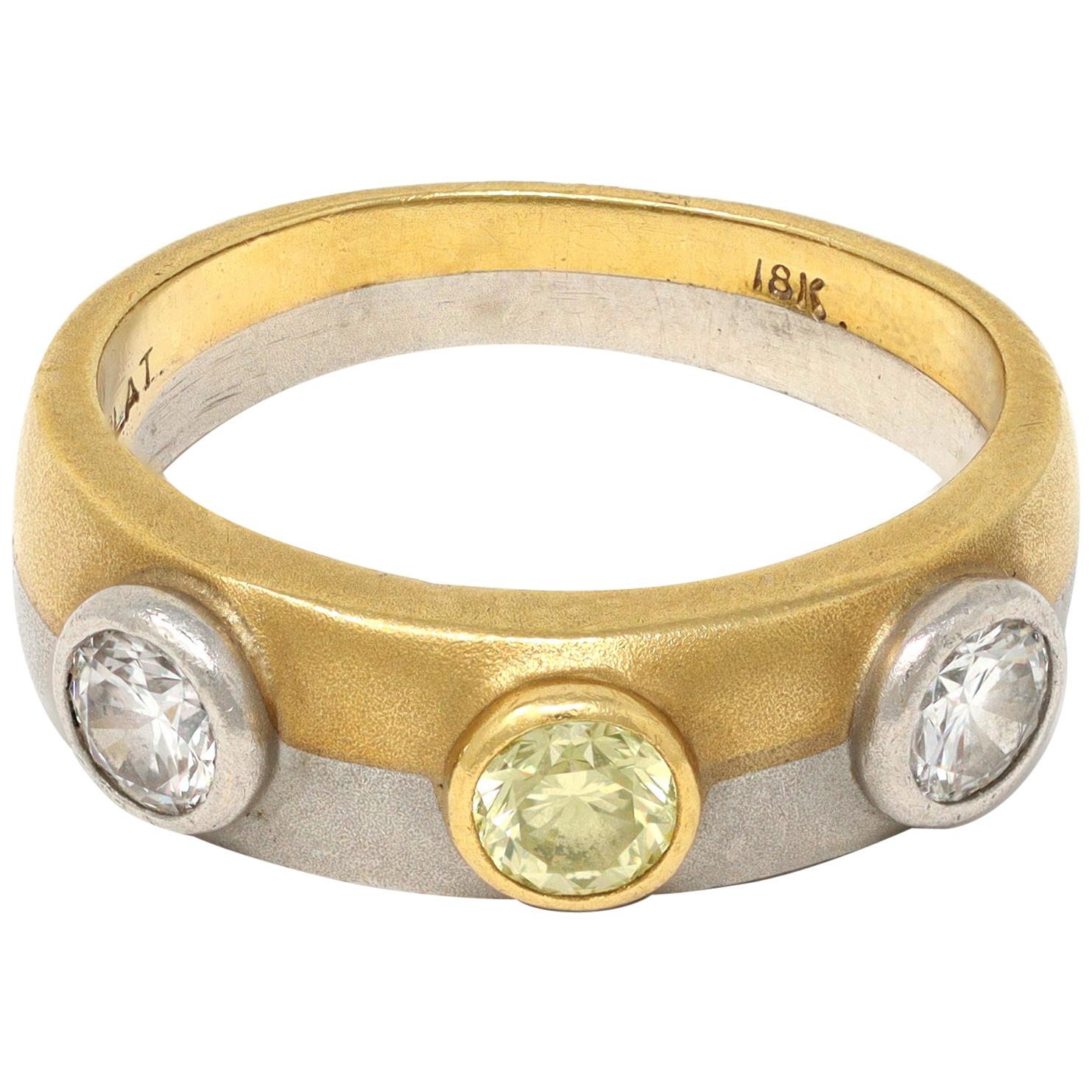 Fused Platinum and 18k Gold Three-Stone Diamond Band Ring