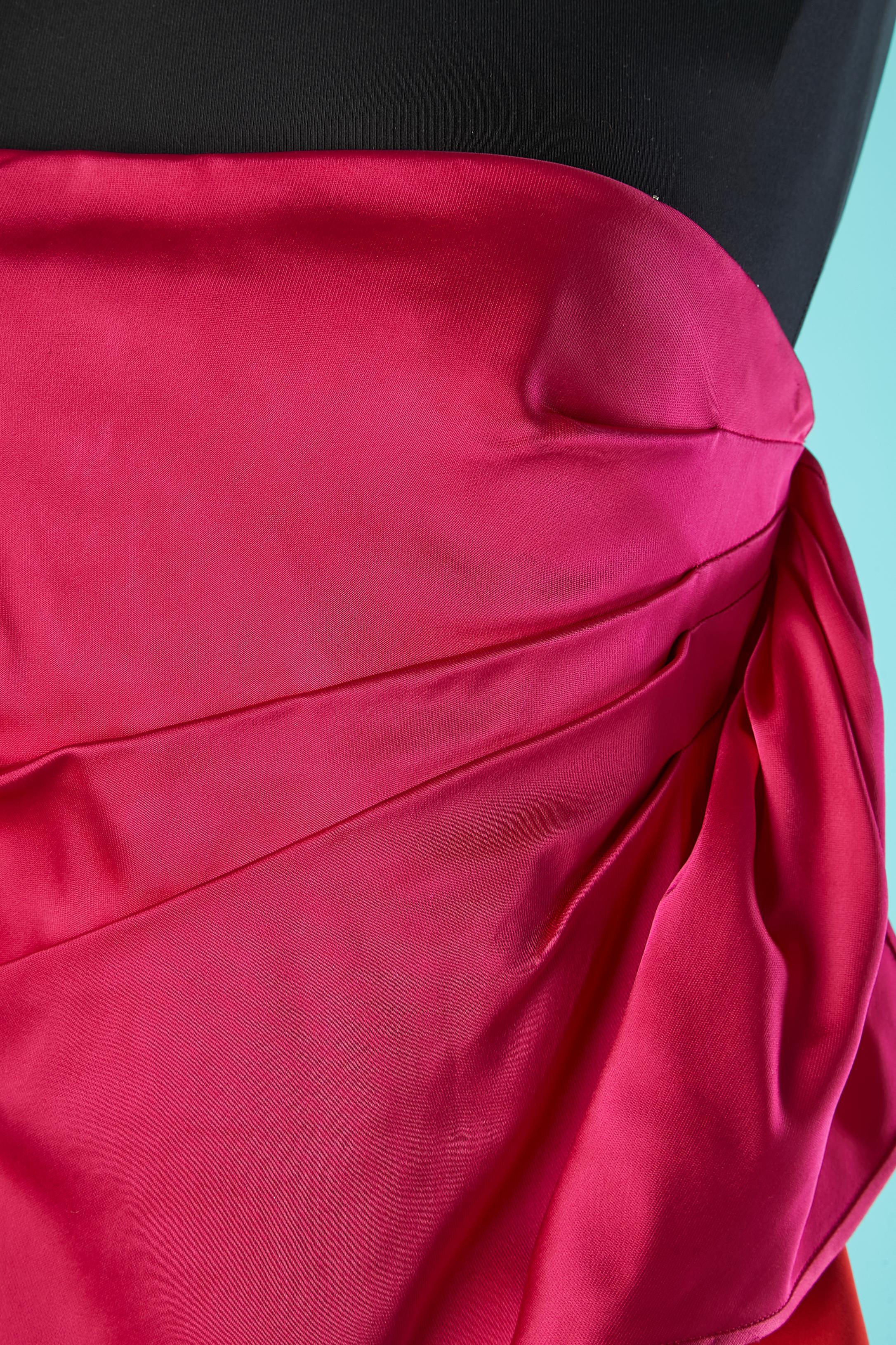 Fushia satin bustier cocktail dress with ruffles on the left side. Main fabric composition: 100% rayon 
Boned bustier inside the dress: 78% polyamide, 22% elasthane with zip closure on the right side and underwired bra. 
Invisible zip closure and