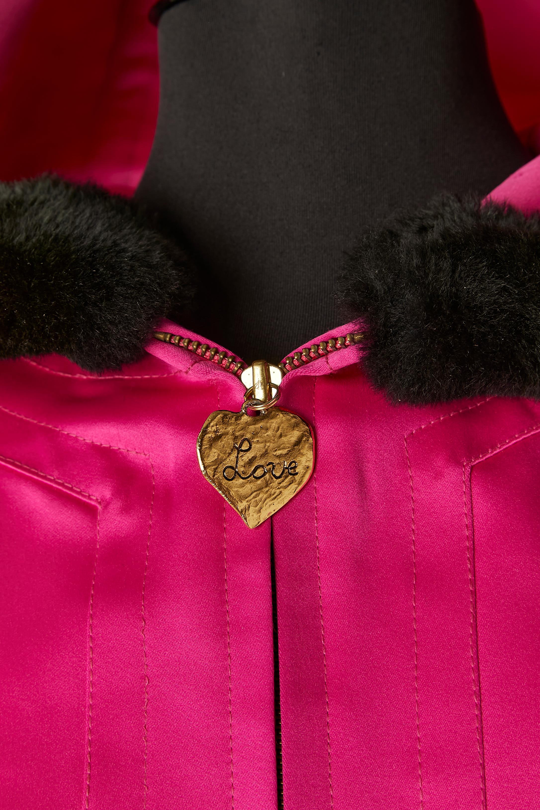 Fushia lightly quilted satin parka with Nutria furs lining and hood . Outshell fabric: 100% satin polyester. Lining: 100% acetate. Fur trim : Nutria ( Ragondin in french) 
The fur lining is detachable with button and buttonhole. Shoulder-pads. Zip