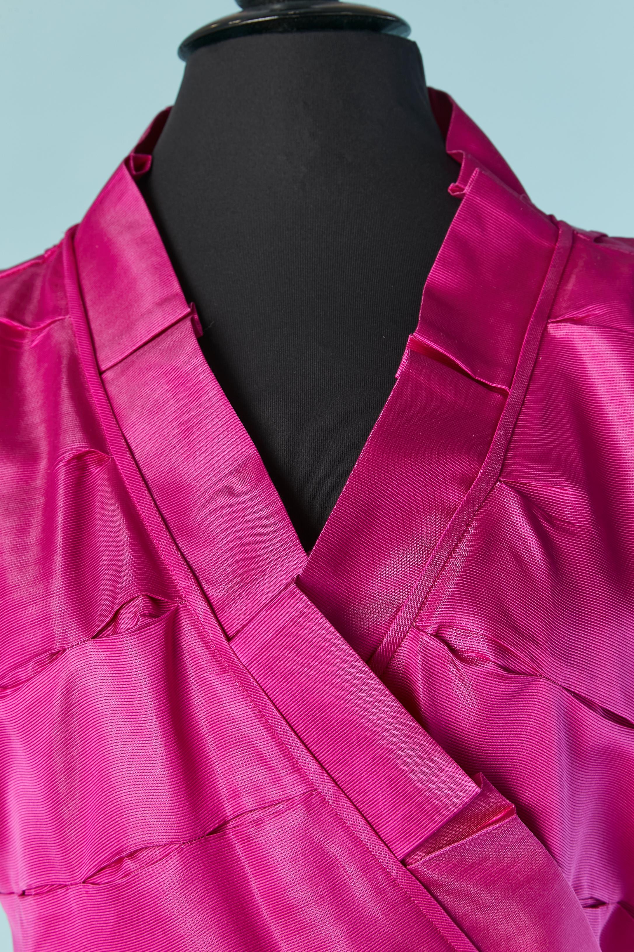 Fushia silk wrap dress. Elastic band around the armhole. 
SIZE 8 (US) 