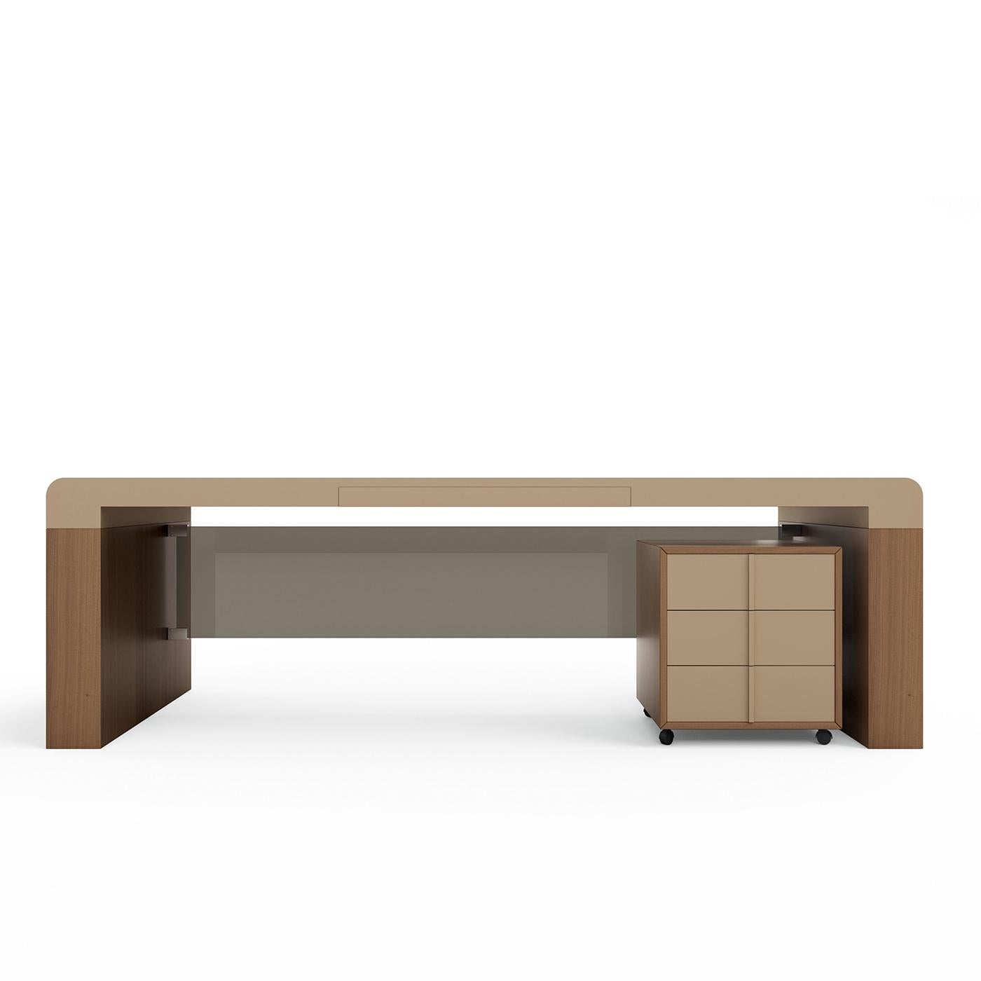 Designed for presidential offices, this desk's large scale conveys a sense of importance. The soft lines of its rope-colored leather desktop contrast the sharp edges of its dark canaletto-walnut legs, making it extremely modern, sophisticated and