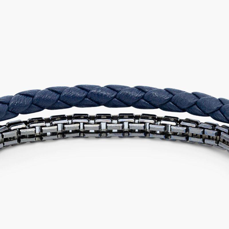 Fusione Bracelet in Italian Navy Leather with Black Rhodium Plated Sterling Silver, Size L

A unique fusion of blue-coloured Italian leather, a venetian box chain, brushed black rhodium plated sterling silver components and our pop clasp, all