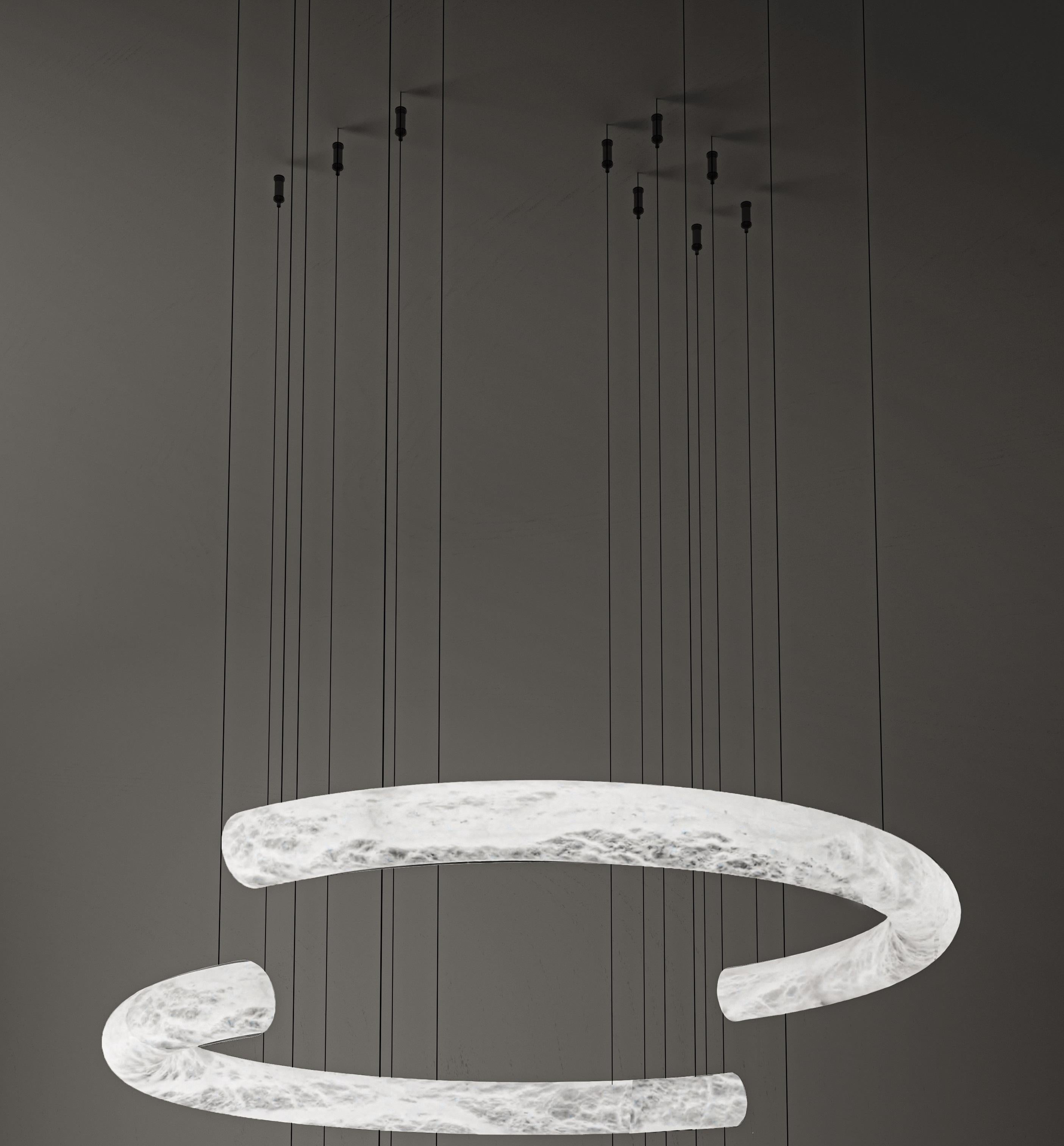 Lampada a sospensione Futatsu Large di Alabastro Italiano
Dimensioni: Ø 105 x H. 200 cm.
Materiali: Alabastro bianco e metallo.

Disponibile in diverse finiture: Argento lucido, Bronzo, Ottone spazzolato, Ruggine di Firenze, Brunito spazzolato, Oro