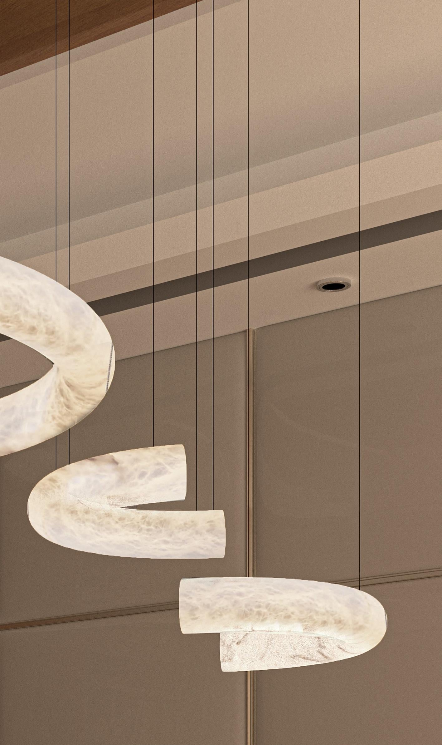Futatsu Small Suspension Lamp by Alabastro Italiano
Dimensions: Ø 56 x H 200 cm.
Materials: White alabaster and metal.

Available in different finishes: Shiny Silver, Bronze, Brushed Brass, Ruggine of Florence, Brushed Burnished, Shiny Gold, Brushed