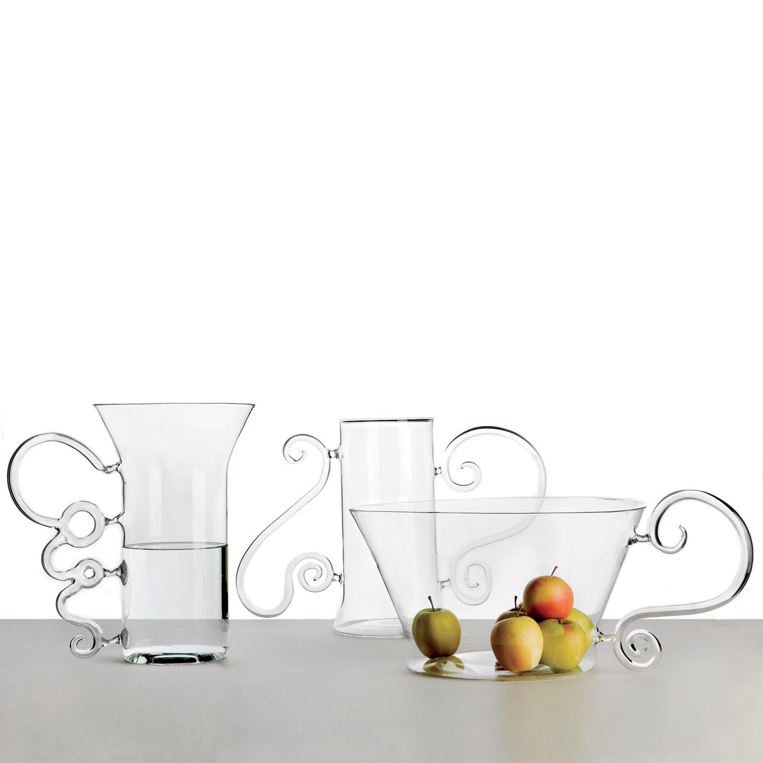 The Futiles collection has a Baroque taste with a frivolous essence. Dimensions are generous for all the pieces of the collection: a double handle vase, a giant water carafe and an impressive fruit pot, a normal carafe with a sumptuous handle. ?The