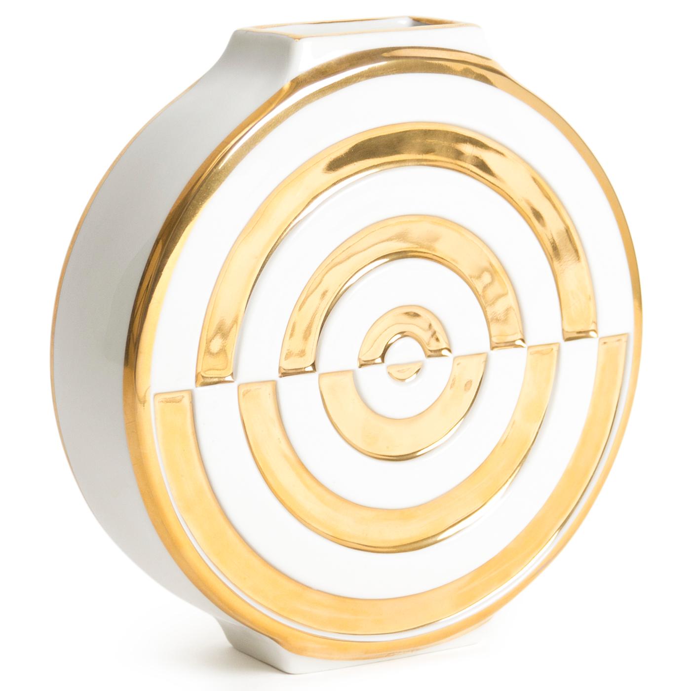 Golden Glamour. Modernist motif, socialite style. Our Deco-fied Futura Bullseye Vase features an Op Art inversion of a standard bullseye design rendered in glossy high-fired porcelain with real gold accents. Bring a modernist and mind-bending moment