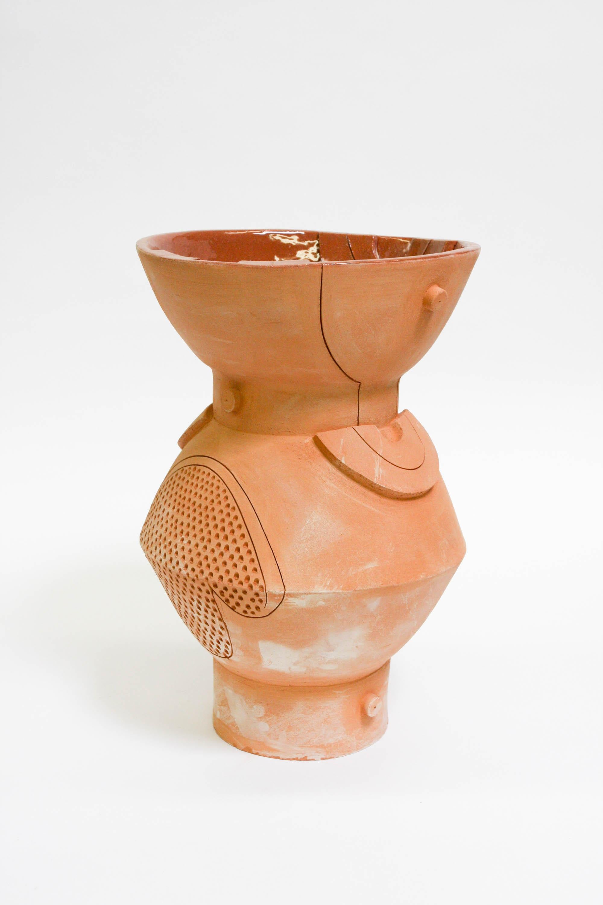 Futurist extra large double circle terracotta planter, raw terracotta 14 x 22?

Unlimited terracotta editions, individual vases are unique in size and shape. Hole at bottom for water drainage, outdoor and indoor use. Not meant for outdoor use in