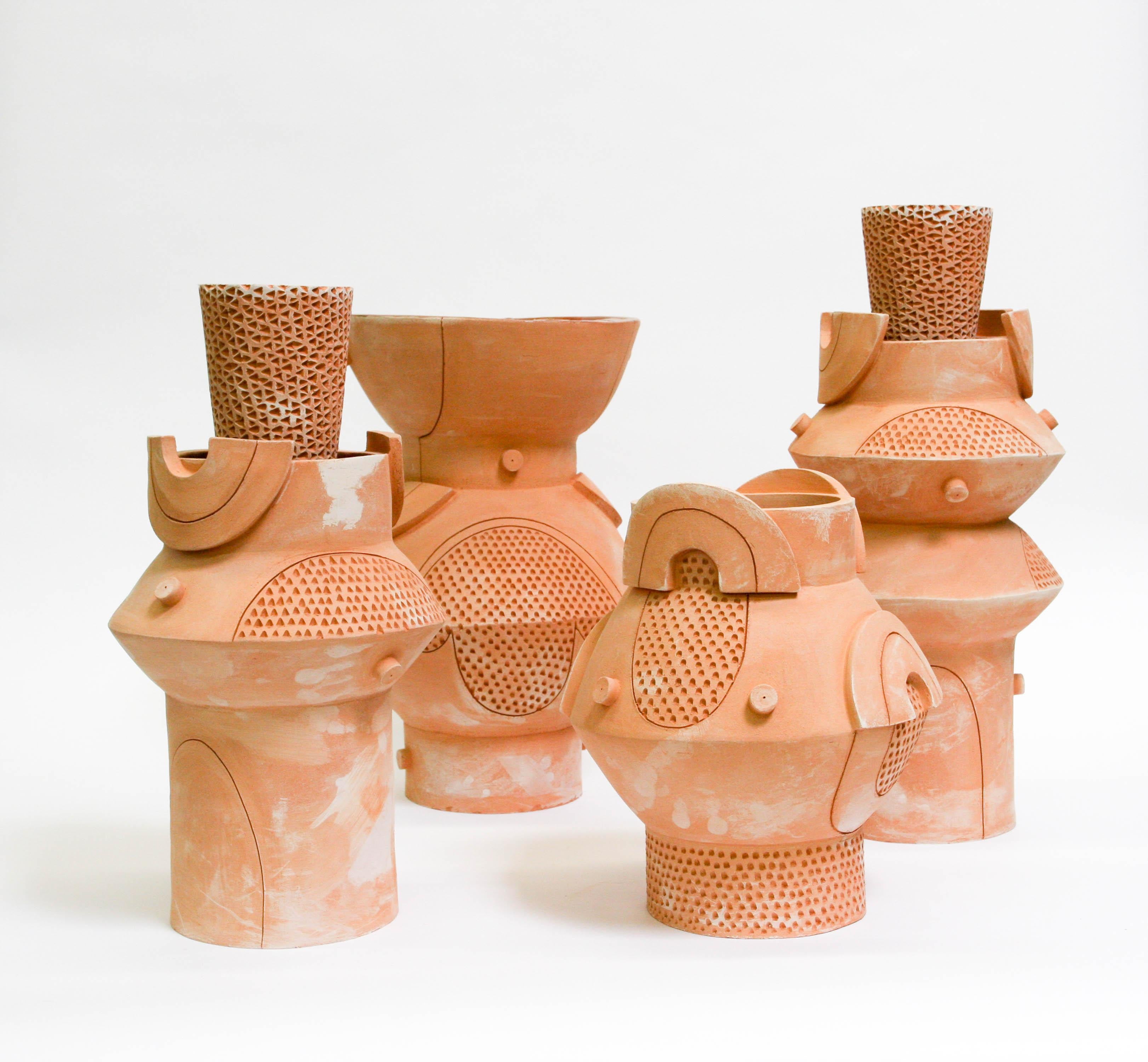 Extra Large circle vase, terracotta. Measures: 11 x 18?

Unlimited terra cotta editions, individual vases are unique in size and shape. Hole at bottom for water drainage, outdoor and indoor use. Not meant for outdoor use in freezing temperatures,
