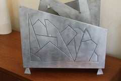 Futuristic Aluminum Magazine / Log Holder Rack