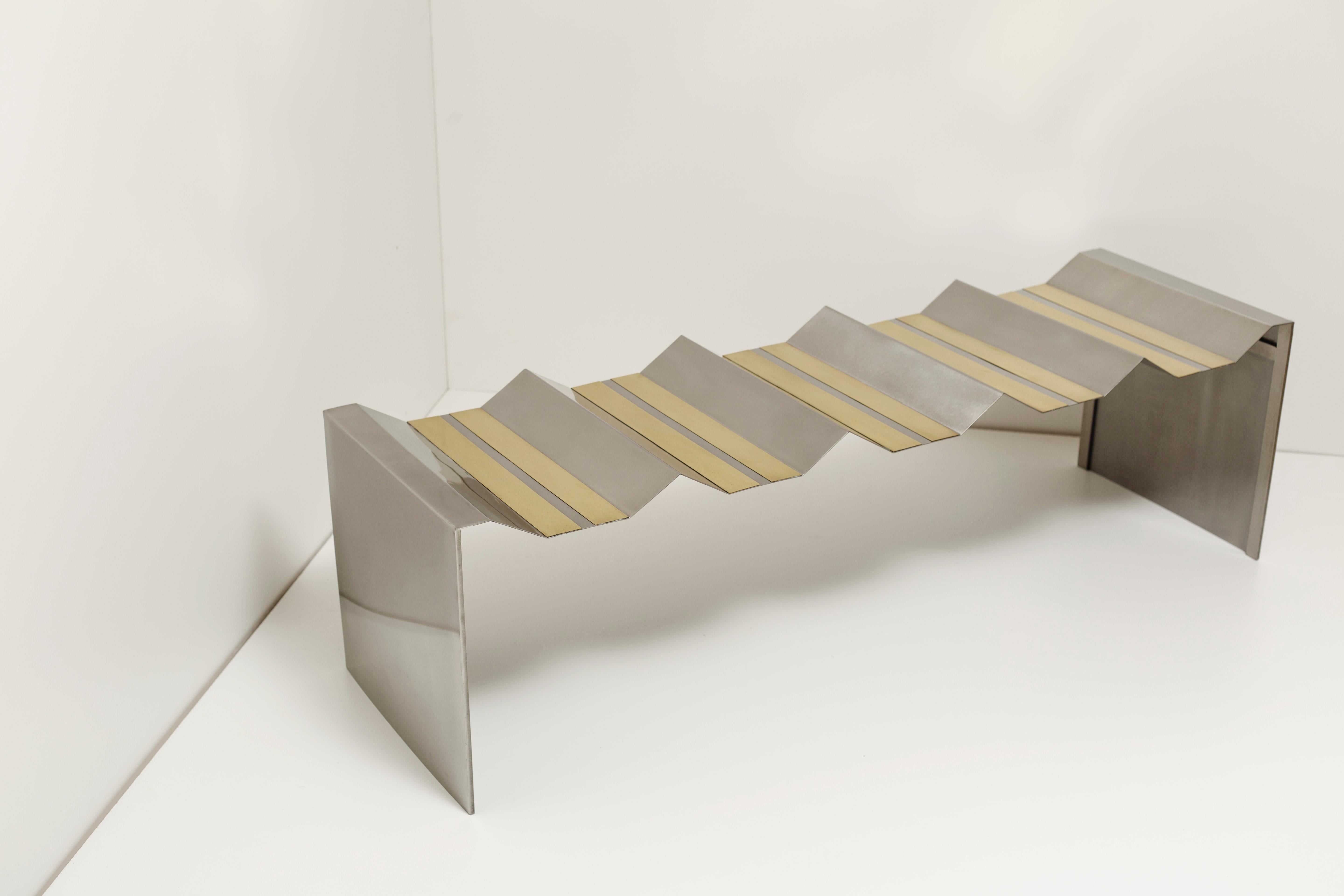 Futuristic bench by Ana Volante Studio
The Moon Collection
Dimensions: L 160 x W 50 x H 42 cm
Materials: Stainless steel and brass

Ana Volante, founder of Ana Volante Studio, is a Venezuelan designer specialized in interior environments,
