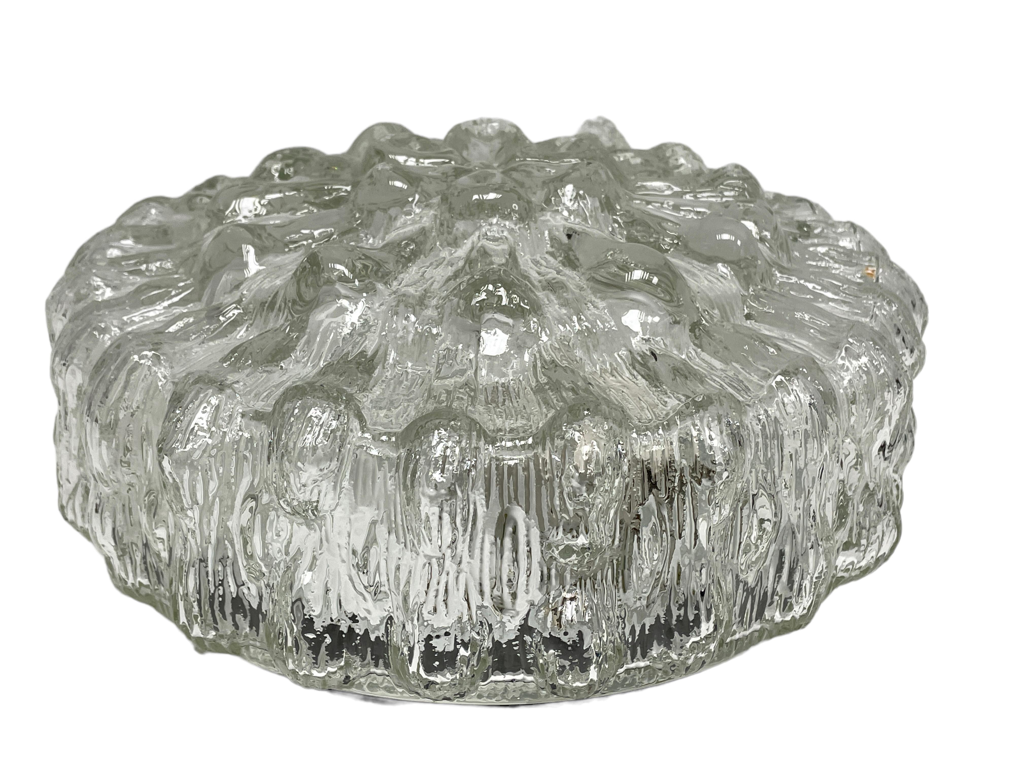 Beautiful organic glass flush mount. Made in Germany attributed to Glashütte Limburg. Gorgeous textured glass flush mount with metal fixture. The fixture requires one European E27 Edison or medium bulb up to 75 watts. A nice addition to any room.