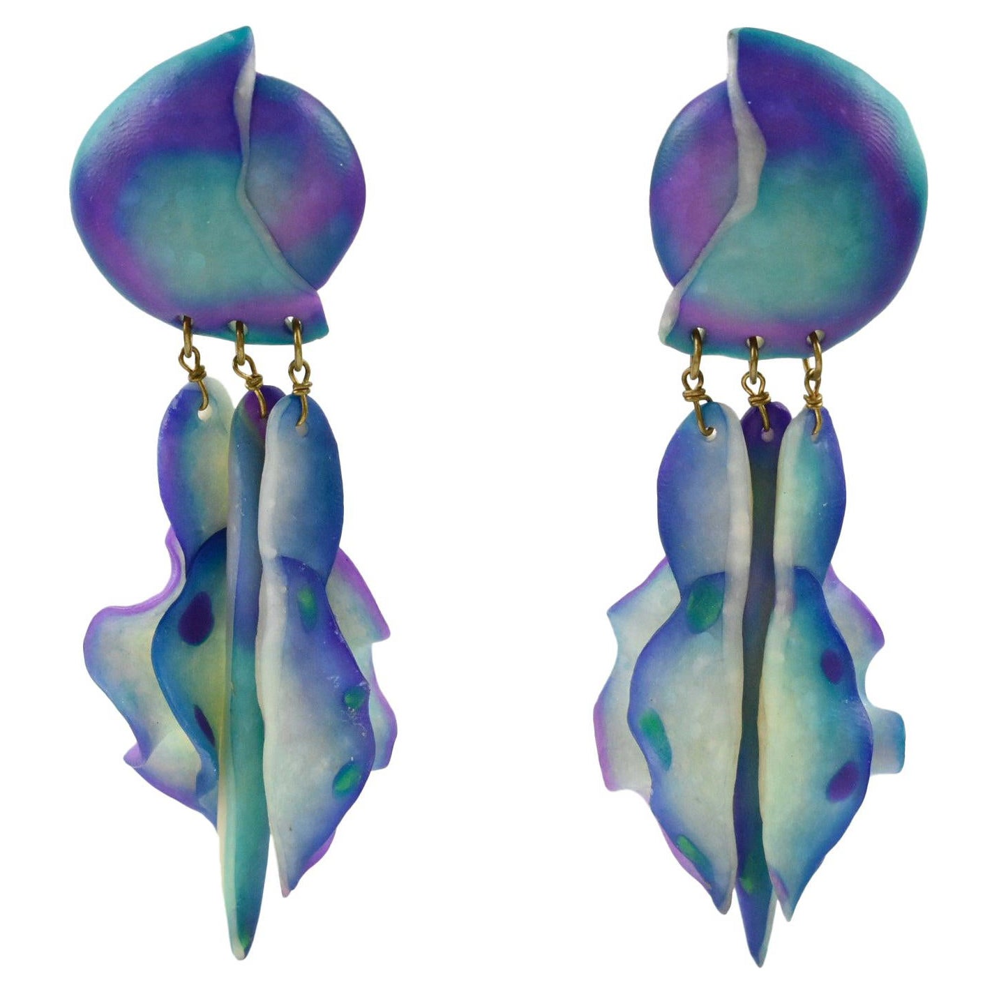Pendientes perforados futuristas de resina turquesa y púrpura en venta