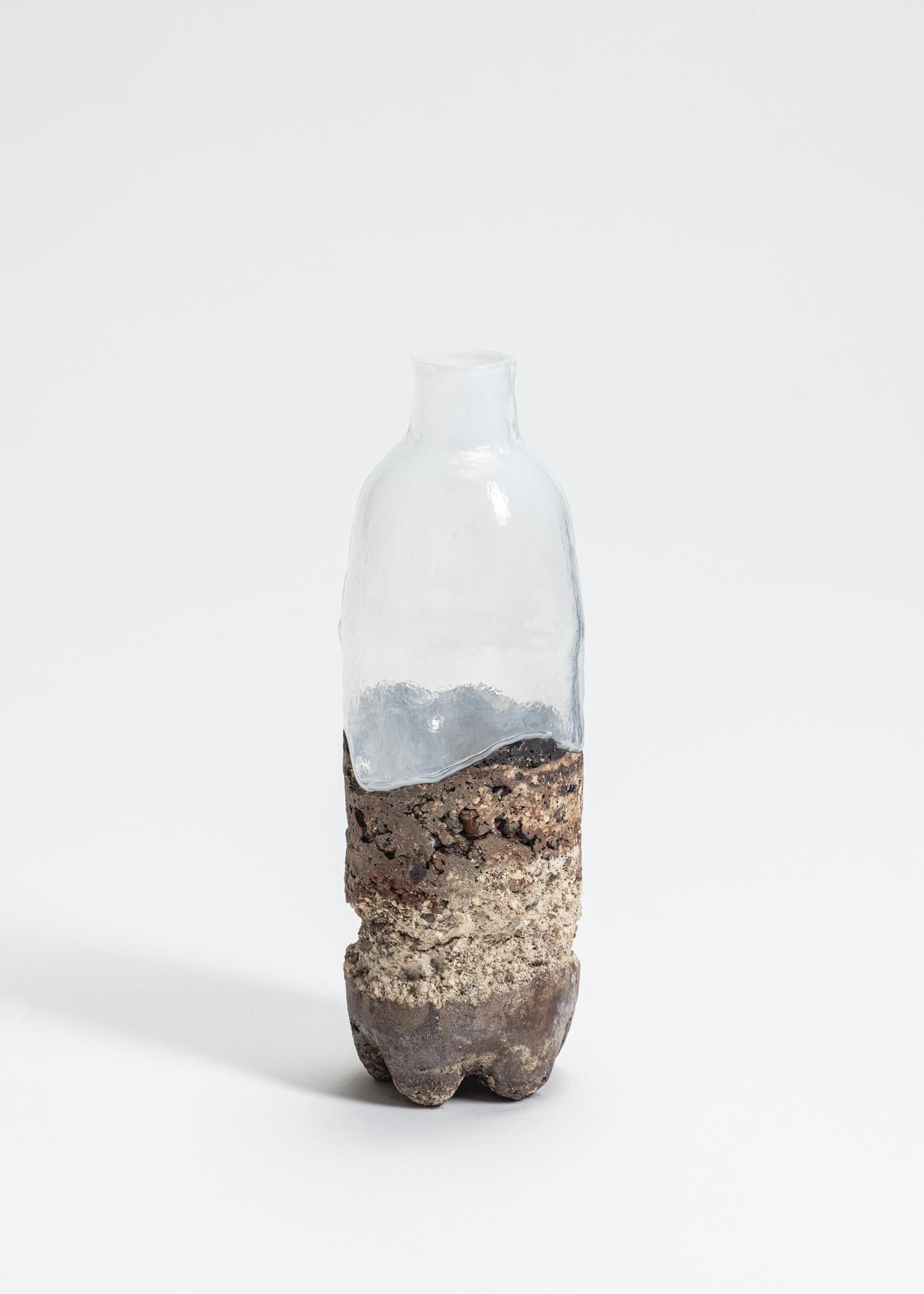 FUWA FUWA, No 10 bottle by Yusuke´ Y. Offhause
One of a Kind, the work is in two parts (ceramic and glass).
Dimensions: D 7.5 x W 7.5 x H 23.5 cm.
Materials: stoneware, porcelain, glass.

Yusuke´ Y. Offhause:
