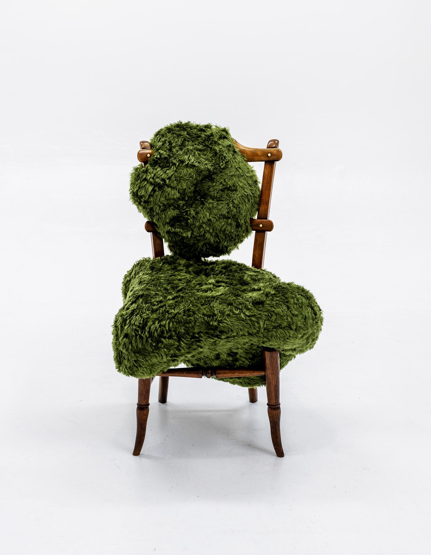 Part of the Hi!breed family, this chair is sculpted from a repaired Victorian bedroom chair and biomorphic upholstery. This series of chairs explore polarizing themes surrounding object and subject, hard and rigid, soft and malleable and also the