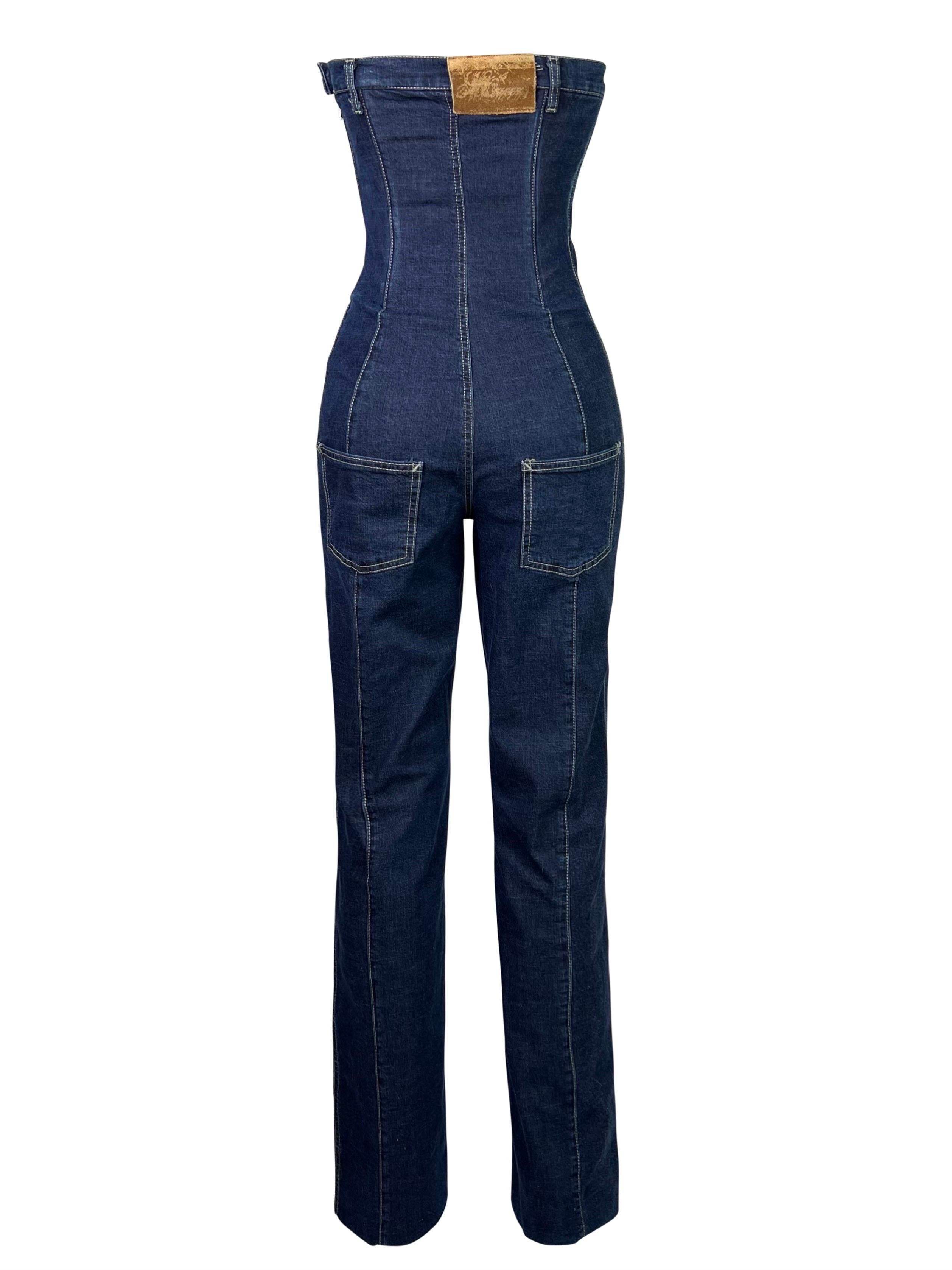 An absolute rarity from Alexander McQueen's one of the most prominent collections. 

This stunning denim jumpsuit has an integrated corset which gives its wearer a very flattering silhouette. 

Missing composition/size label, but fit corresponds to