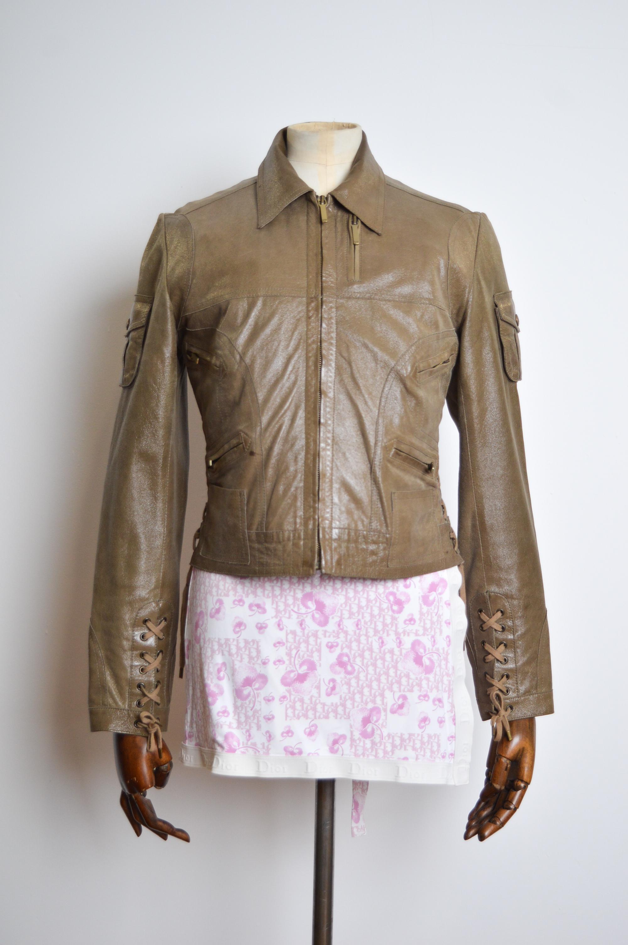 Fall / Winter 2002 Christian Dior by John Galliano Leather Jacket, crafted from a khaki green leather with corset style lace up detailing.

MADE IN FRANCE 

100% Goat Leather / 100% Silk lining.

Measurements in Inches - 
Pit to Pit -18