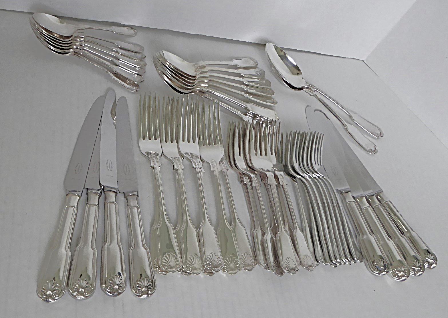 George Butler of Sheffield England silverplated (EPNS) cutlery from the Cavendish Collection Fiddle Thread & Shell pattern. Eight sets of 6 pieces consisting of Dinner Knife, Dinner Fork, Salad/Fish Fork, Dessert Fork, Soup Spoon and Tea Spoon. Alsp