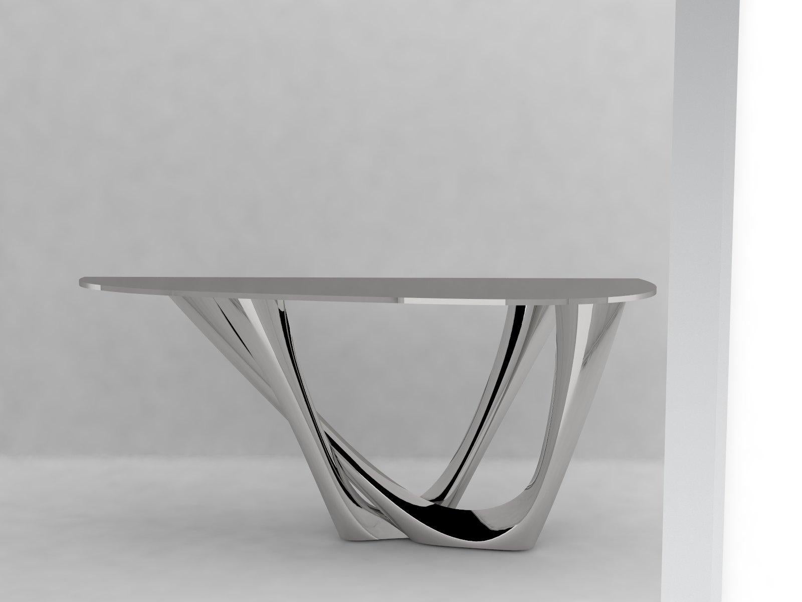 G-Console è un altro oggetto bionico della nostra collezione. Creato per gli spazi più piccoli, offre un'altra possibilità di progettazione degli interni e allo stesso tempo conserva la forma unica del G-Table originale. Entrambi gli oggetti sono