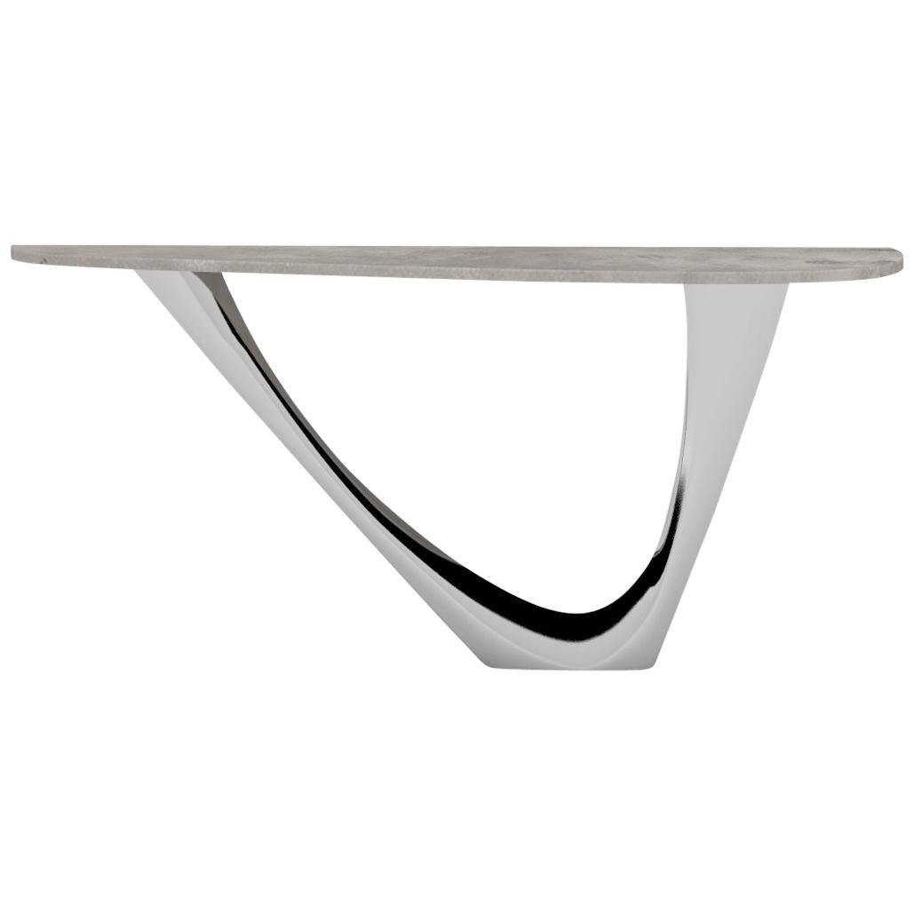 Table monotable G en acier inoxydable poli avec plateau en béton par Zieta