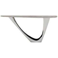 Tavolo G-Console Mono in acciaio inox lucido con piano in cemento di Zieta