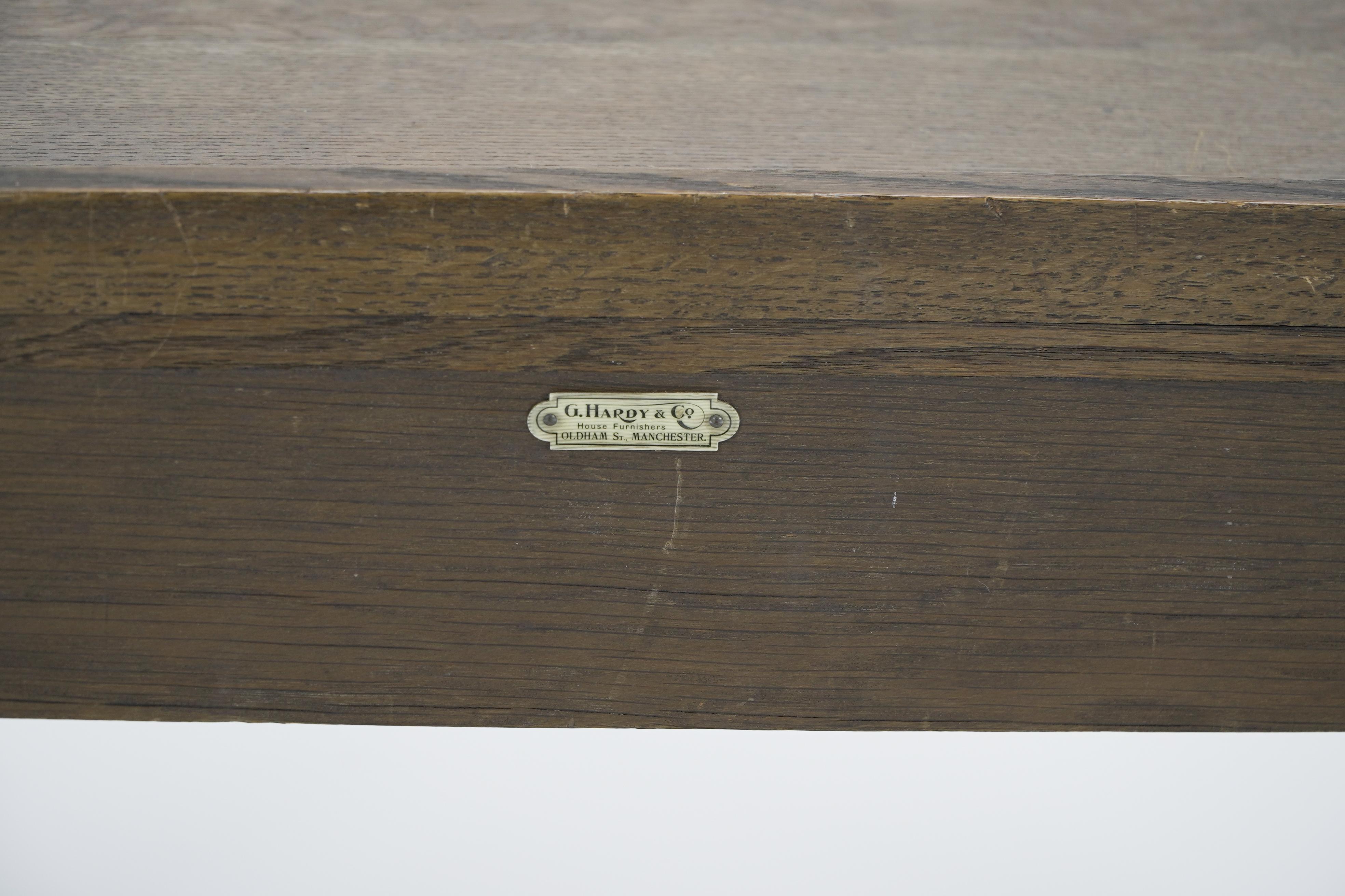 G F Hardy. An oak childs desk with a slanted writing area and storage underneath For Sale 2