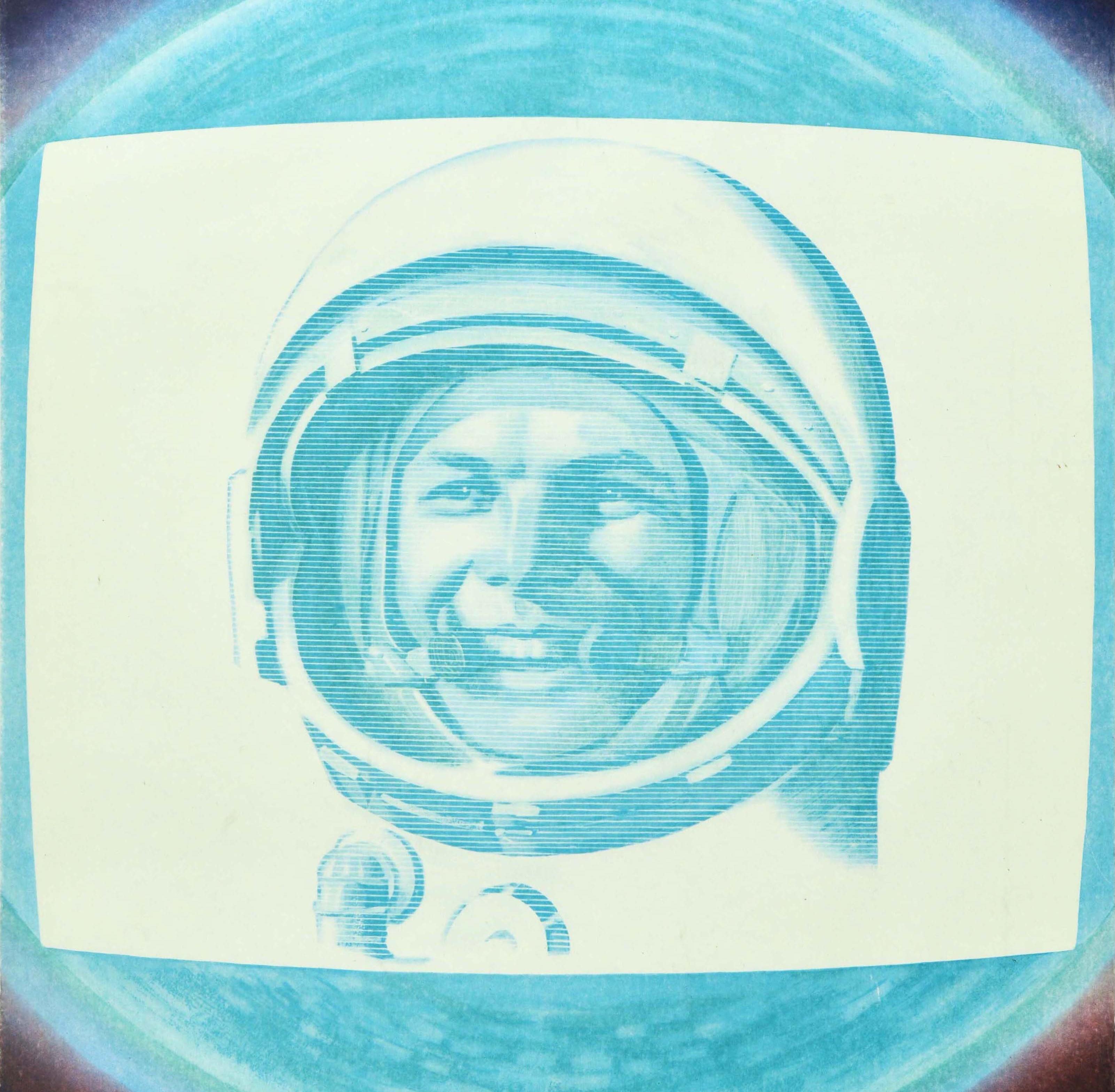 Original vintage Soviet space poster in celebration of Cosmonautics Day - Glory to Yuri Gagarin the first cosmonaut in the world! / Слава Юрию Гагарину первому космонавту мира! - featuring a smiling Yuri Gagarin (Yuri Alekseyevich Gagarin;