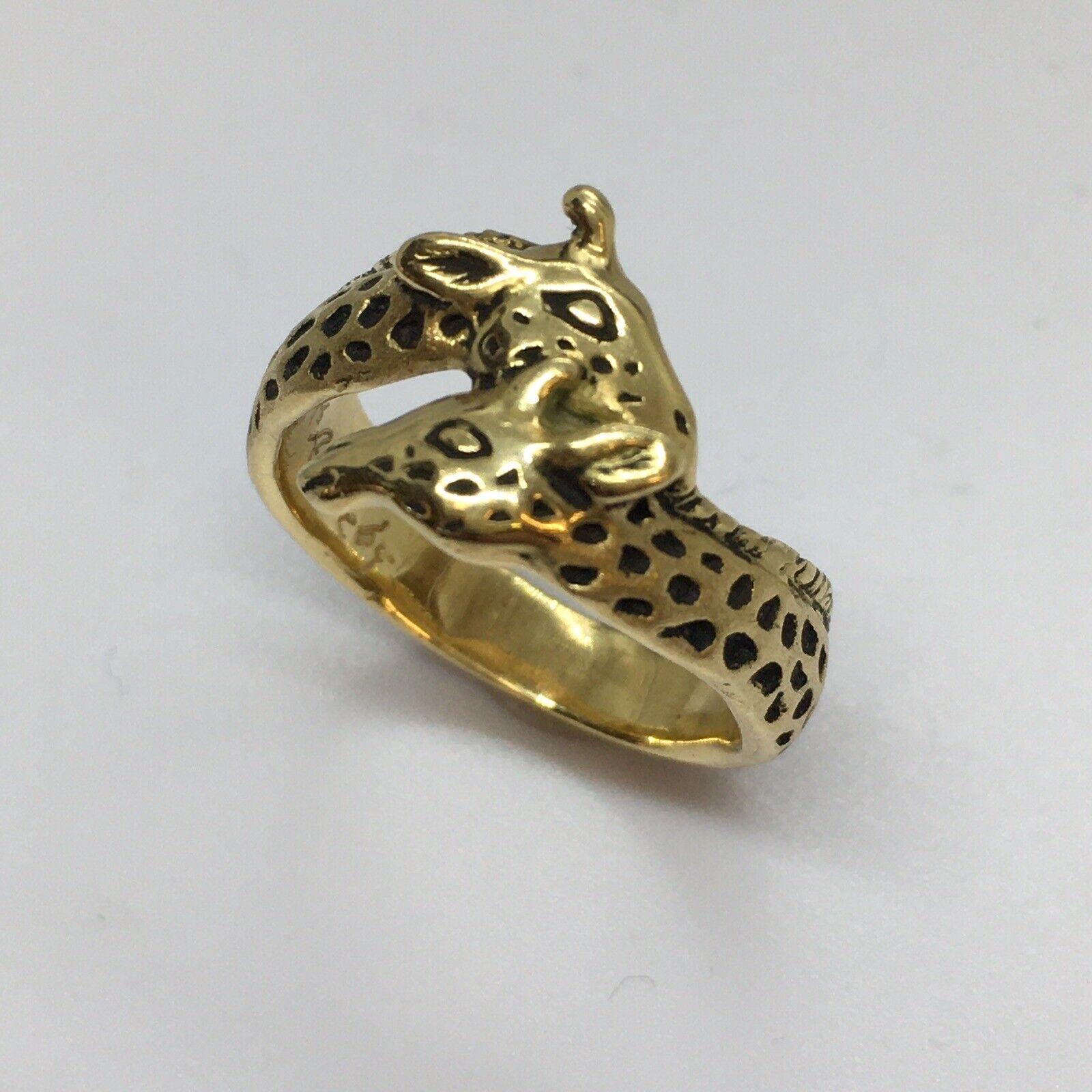 
G & G Appleby 18 Karat Yellow Gold  Enamel Double Giraffe Ring



Gregory A. Appleby born in Van Nuys, Ca. He partnered with Gayle Bright and began sculpting precious metal jewelry. Their work has been featured in many galleries.  Gayle and Gregory