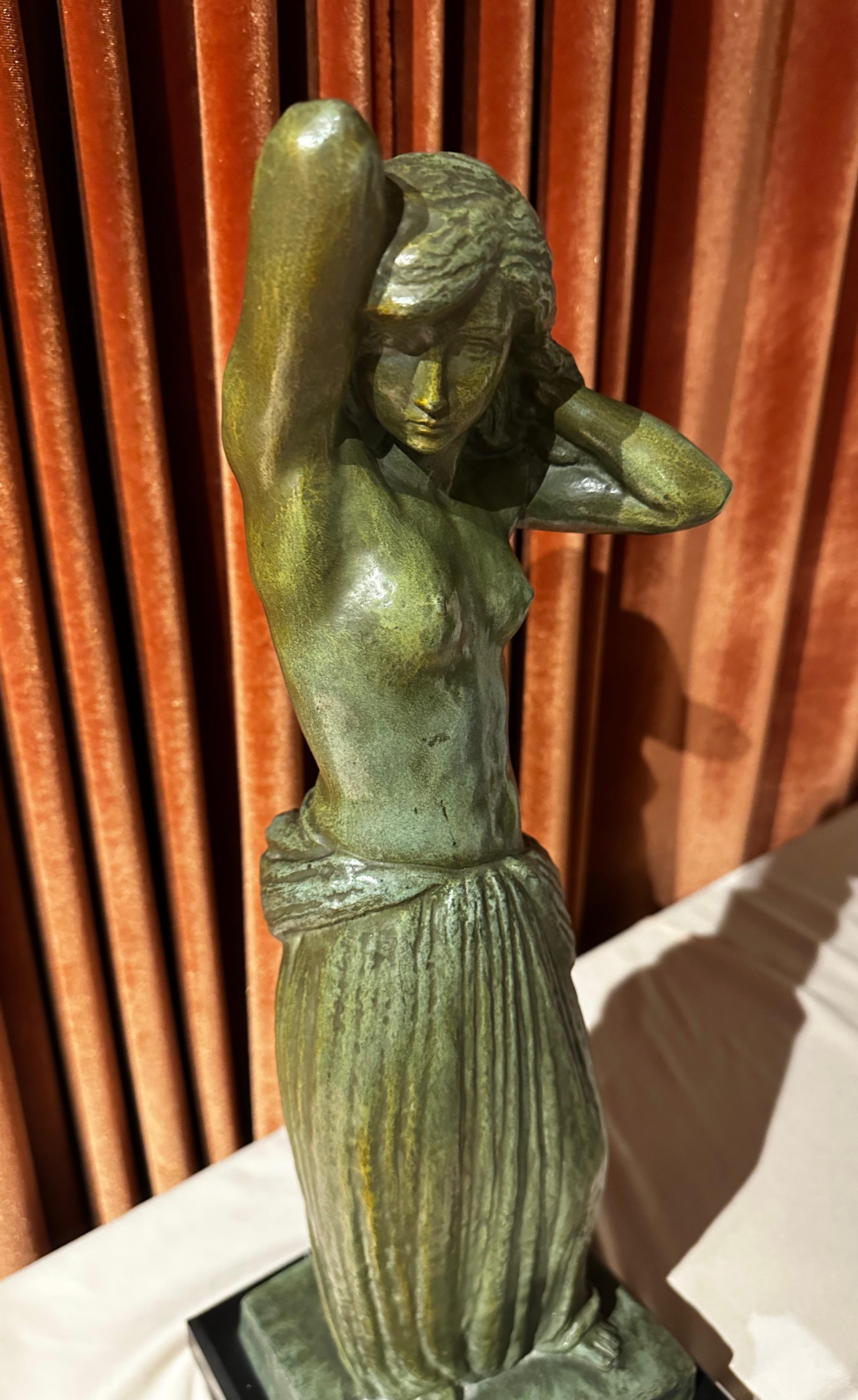 G Gori bronze Female draped nude statue Classic Art Deco made in France. A verdigris green patinated bronze sculpture depicting a bare-breasted female standing with hands behind her head mounted on a marble base. 1925-1930 stylized pose with fine