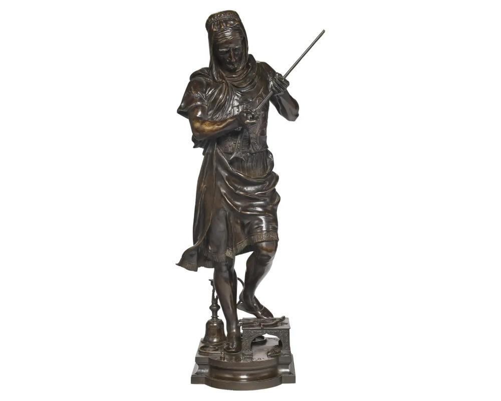 Außergewöhnliche französische orientalische Bronzeskulptur „Le Marchand d' Armes Turc“ aus Bronze – Sculpture von G. Gueyton