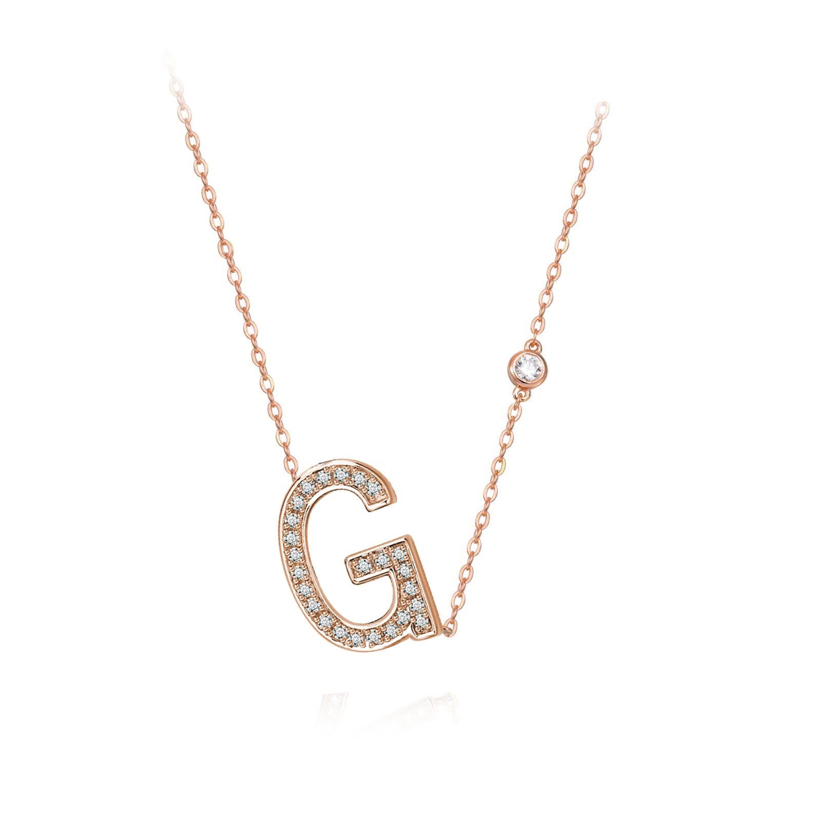 Nothing says YOU more than YOU. You are unique. You are bold. You're not afraid to share who you are. This initial bezel chain necklace is elegantly slimline while sharing a little bit about yourself with others. .925 sterling silver base also