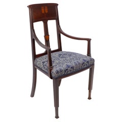 G M Ellwood para J S Henry attri. Un sillón inglés Arts and Crafts de caoba